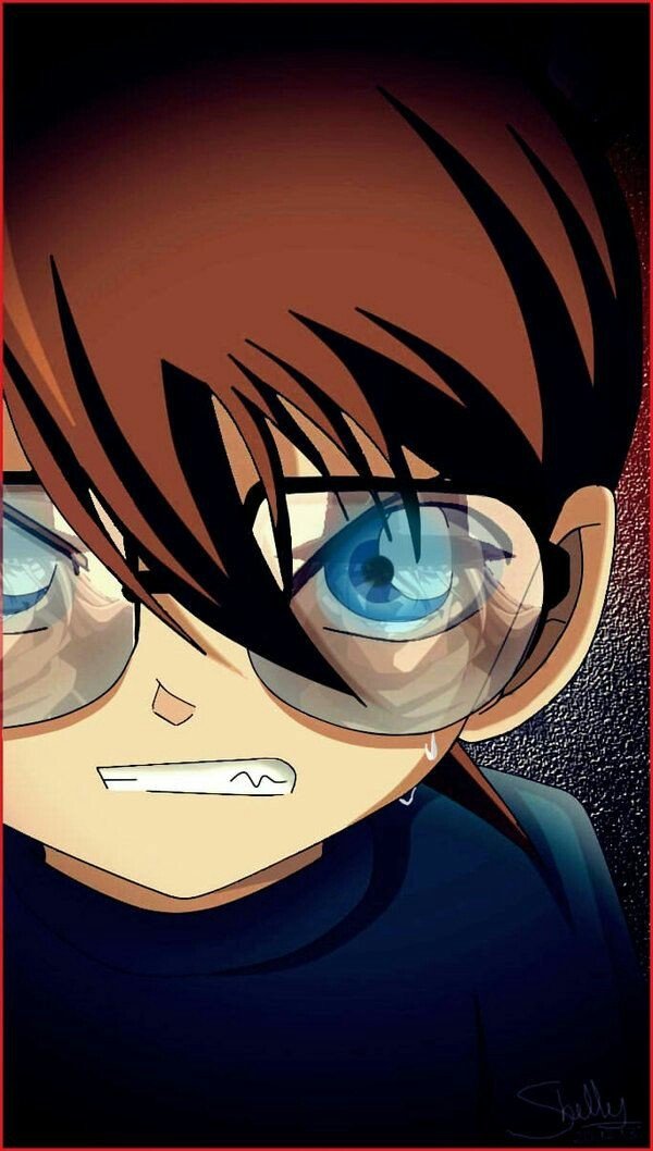 Close-up of anime character Conan Edogawa from Case Closed, with intense blue eyes behind large glass lenses, capturing the determined spirit of Shinichi Kudo.