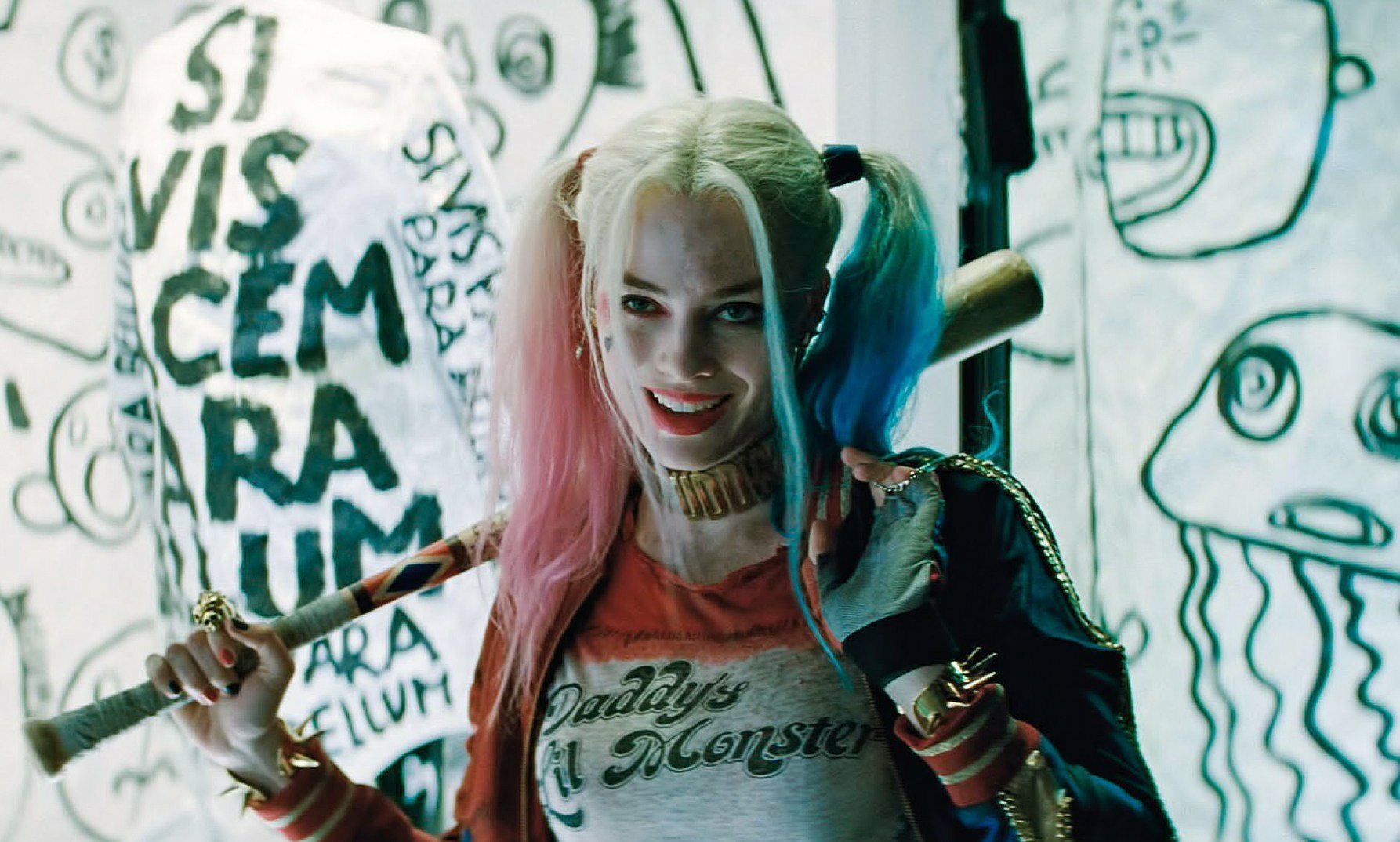 Harley Quinn poses playfully with a baseball bat, sporting her iconic red and blue pigtails. This image captures her character from the movie *Suicide Squad*.