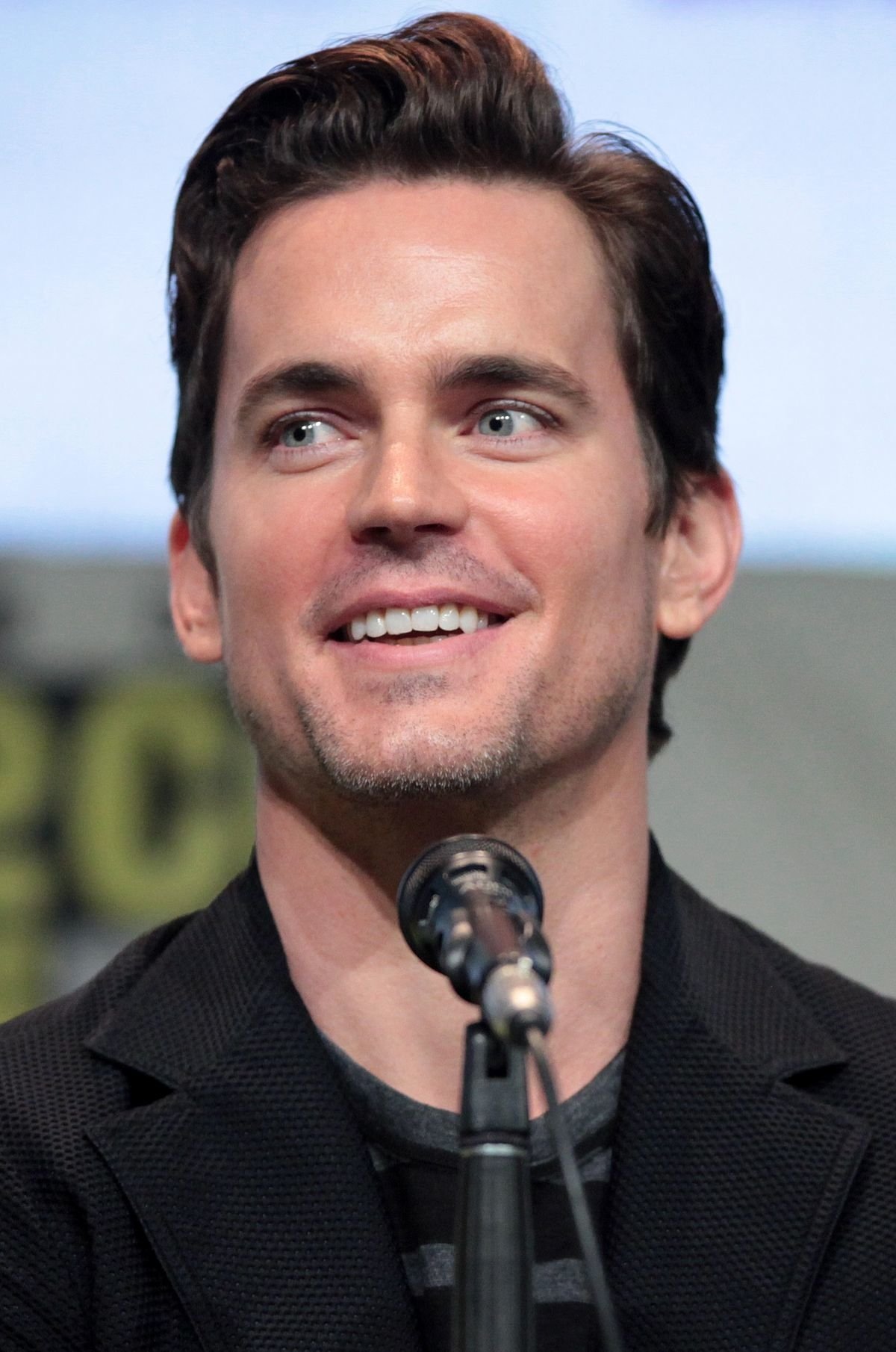 Celebrity Matt Bomer Event smiling microphone Image