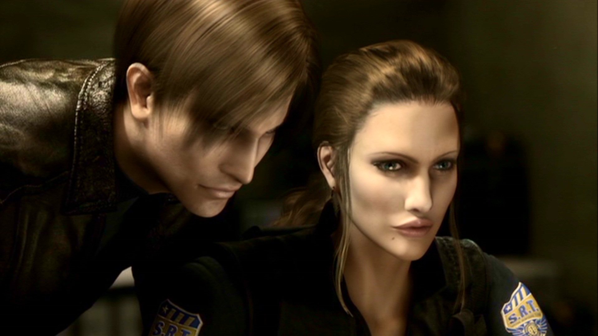 A tense scene from the movie Resident Evil: Degeneration featuring two characters focused on a computer screen.