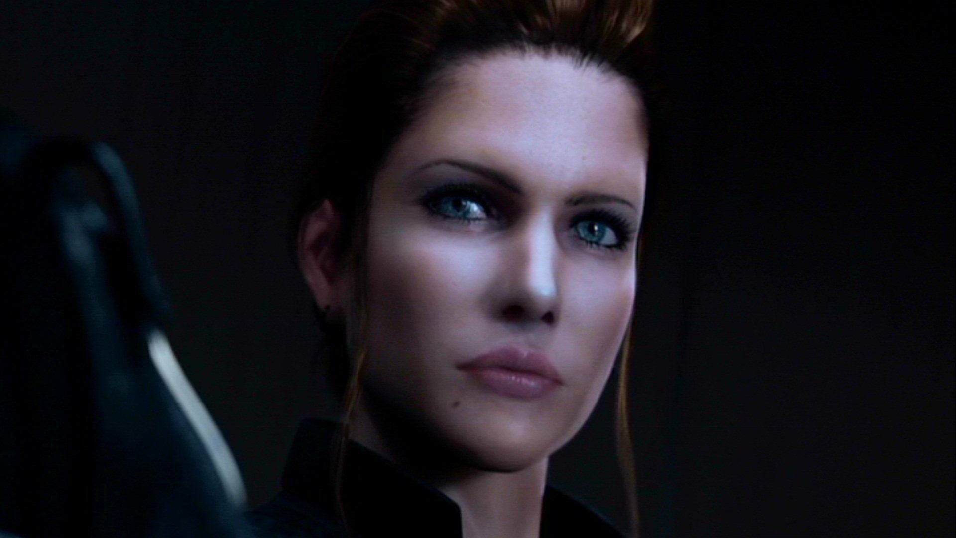 Close-up of a serious female character from the movie Resident Evil: Degeneration, set against a dark background.