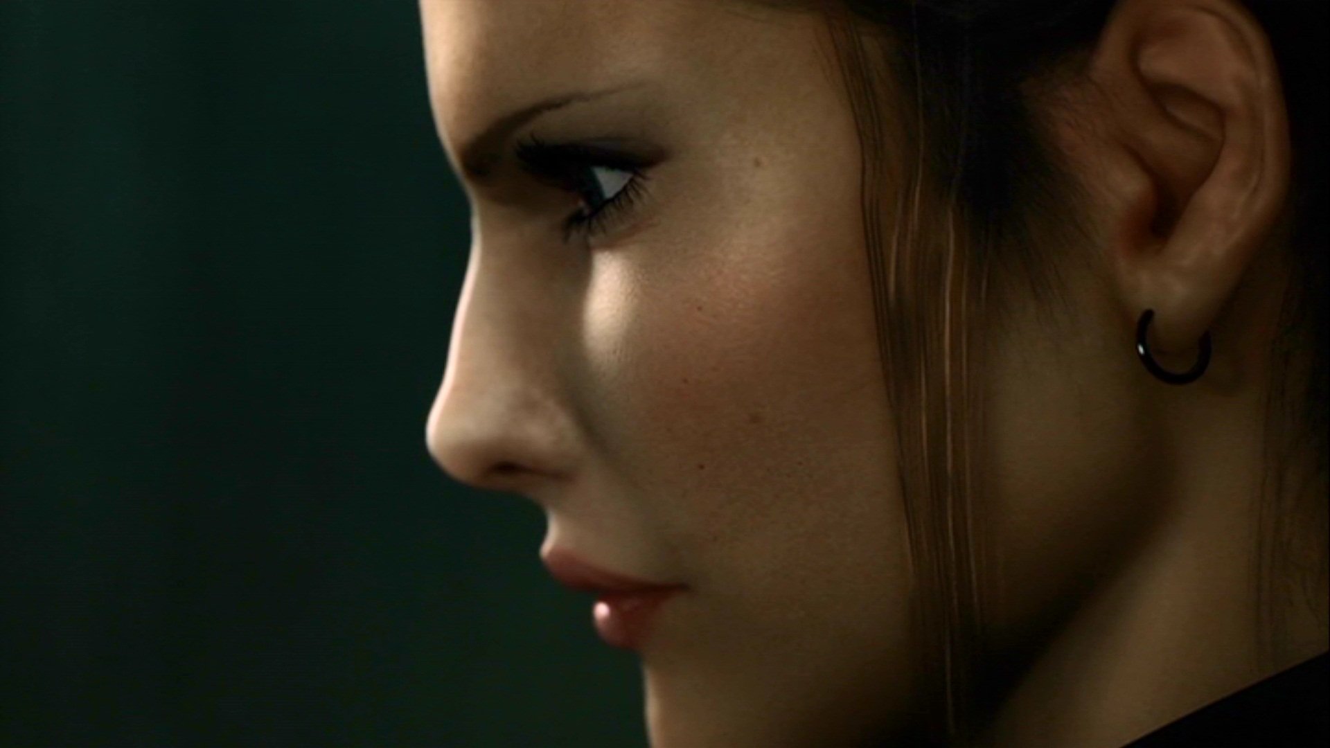 Close-up profile of a woman with an intense expression from the movie Resident Evil: Degeneration.