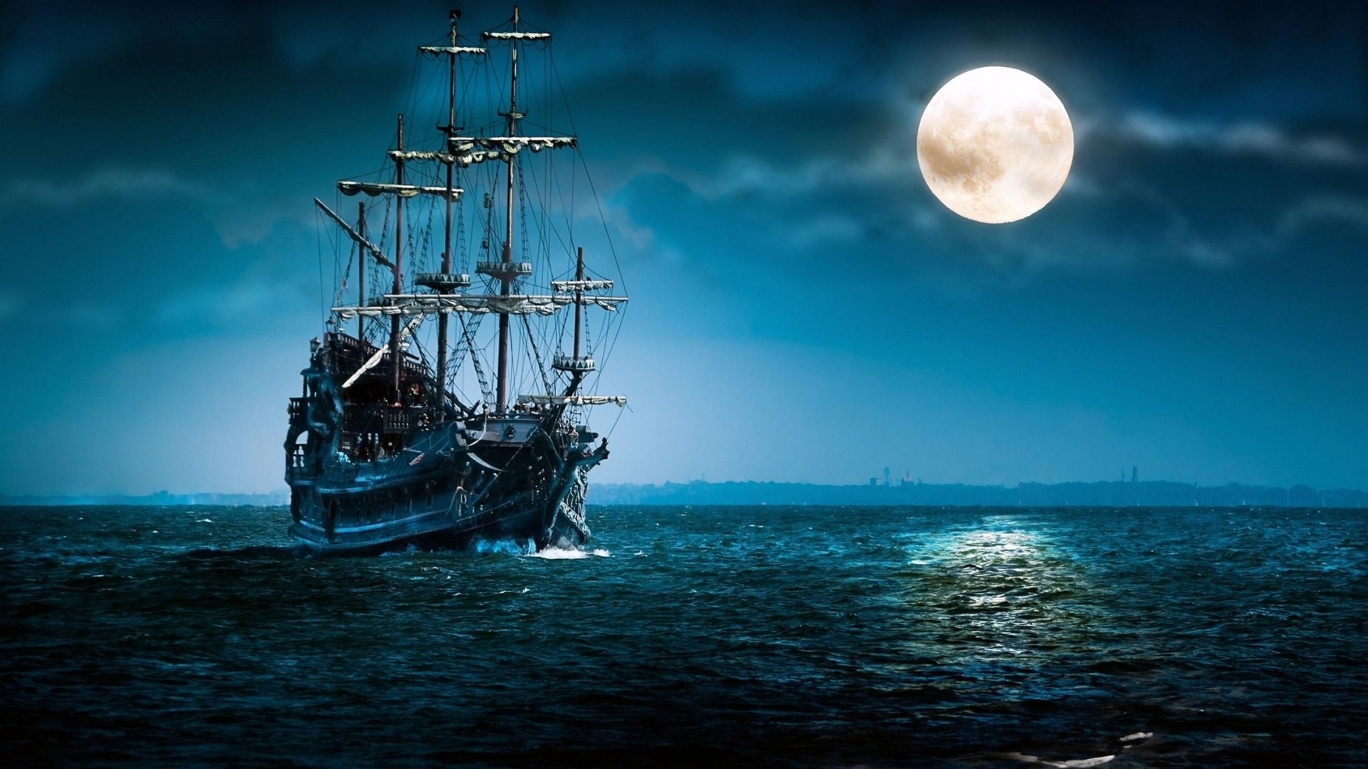 A large sailing ship navigates calm ocean waters at night under a bright full moon, with its sails and masts silhouetted against the dark sky.