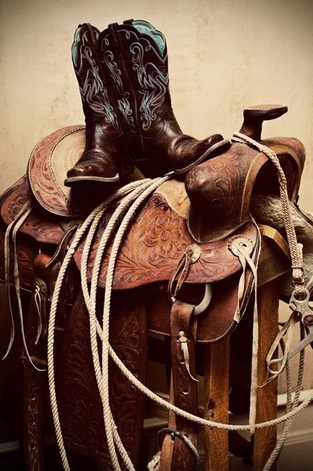 boots man made saddle Image