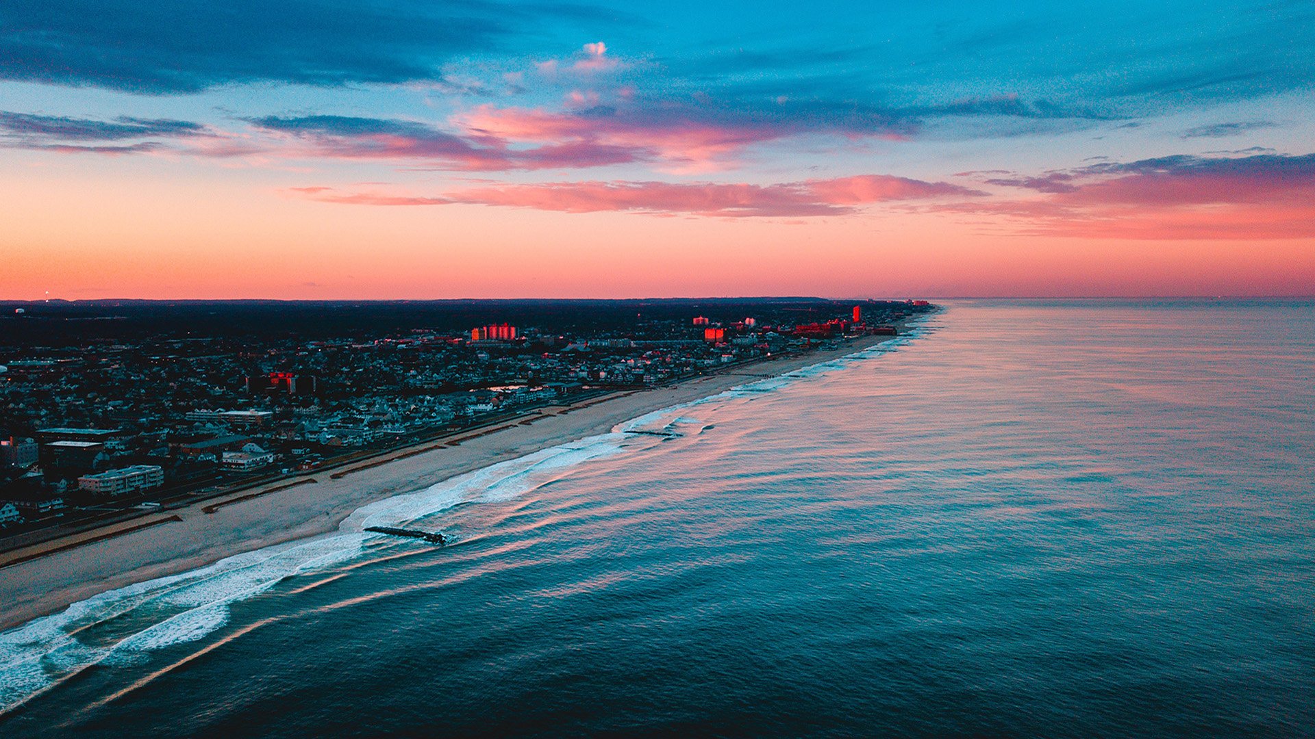 pacific ocean sunset man made city Image