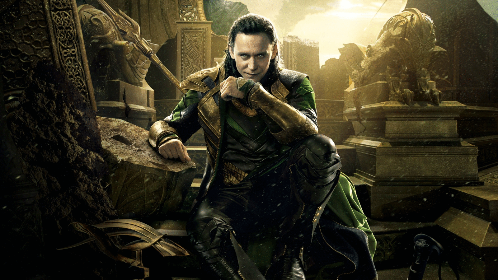 Tom Hiddleston as Loki sits confidently among ancient ruins in a scene from Thor: The Dark World, embodying the character's cunning and charisma.