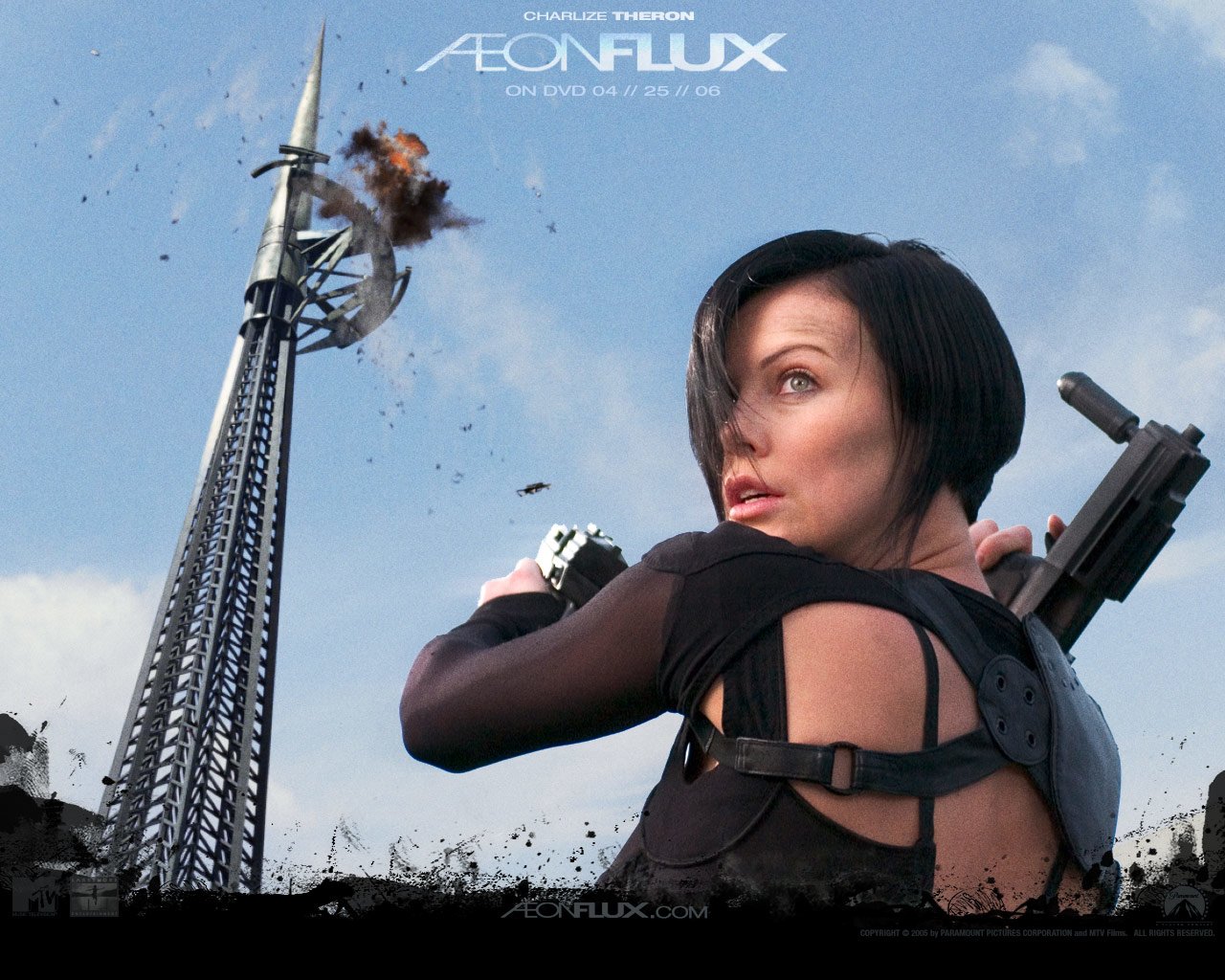 Aeon Flux movie poster: short‑haired heroine in tactical gear aims twin guns as a tall tower bursts into flames against a blue sky.