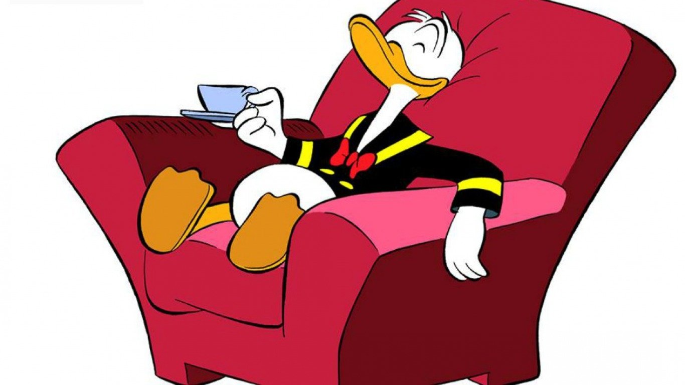 Donald Duck relaxes in a cozy armchair, sipping tea. This iconic Disney character showcases his playful charm in a whimsical movie scene.