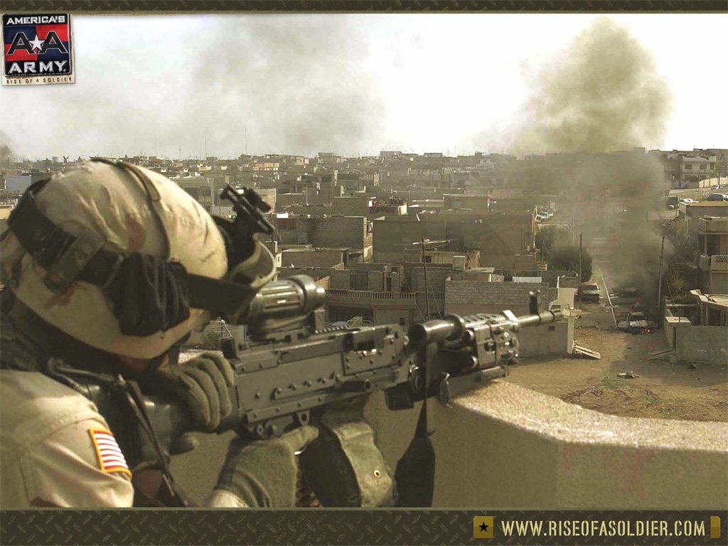 A United States Army soldier aims a rifle from a rooftop, observing smoke rising from the buildings below in a combat zone.