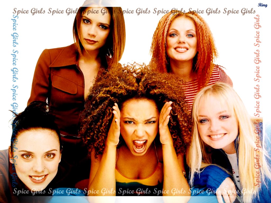 Five smiling women posed for a 1990s pop music promotional portrait, bright outfits and varied hairstyles (I can’t identify or name real people in images).