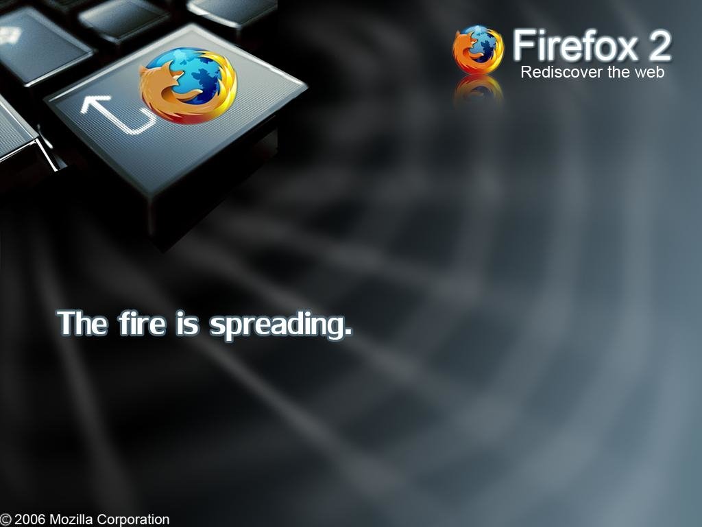 A close-up of a keyboard key featuring the Firefox logo, with the text The fire is spreading, promoting Firefox 2 as a technology for rediscovering the web.