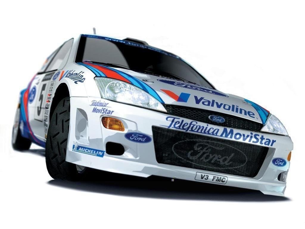 A white rallye vehicle with branding from Valvoline and Telefónica MoviStar shown from a low front angle.
