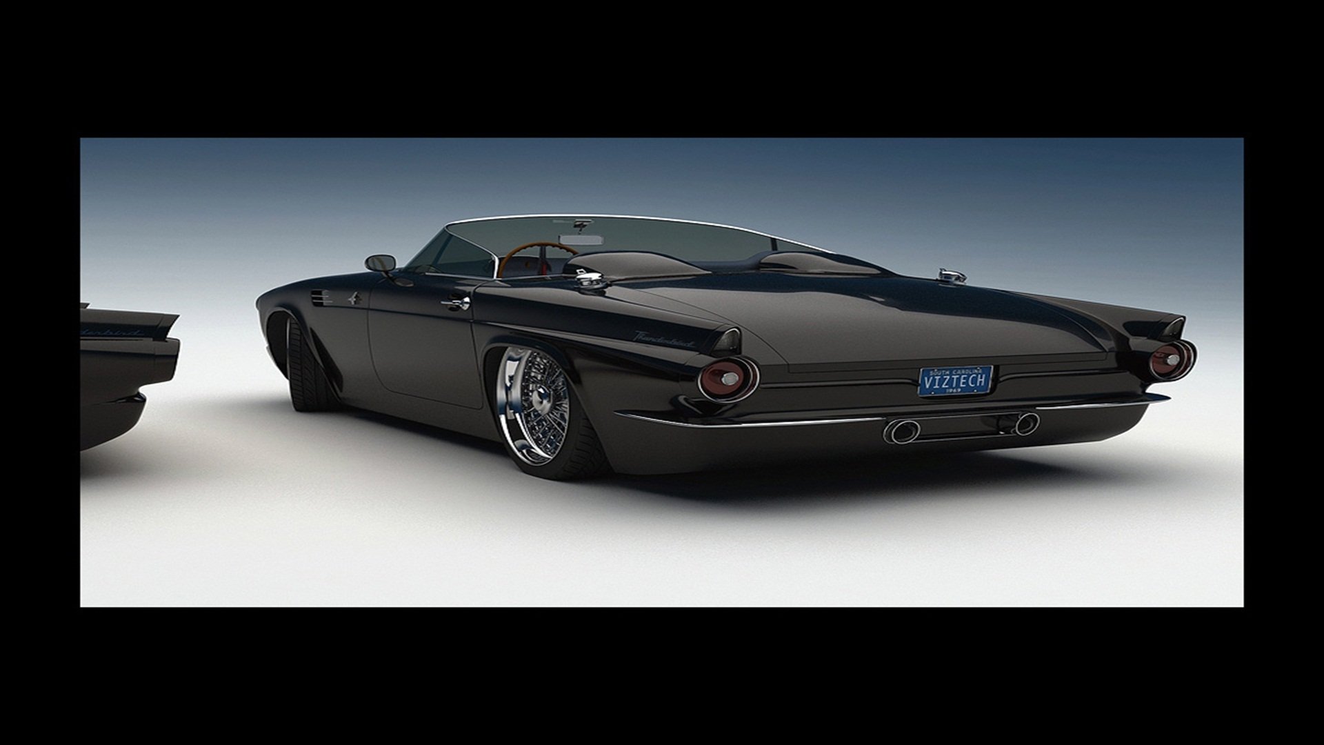 Rear three-quarter view of a low-slung black Ford Thunderbird vehicle with glossy paint, chrome wheels and dual exhaust.