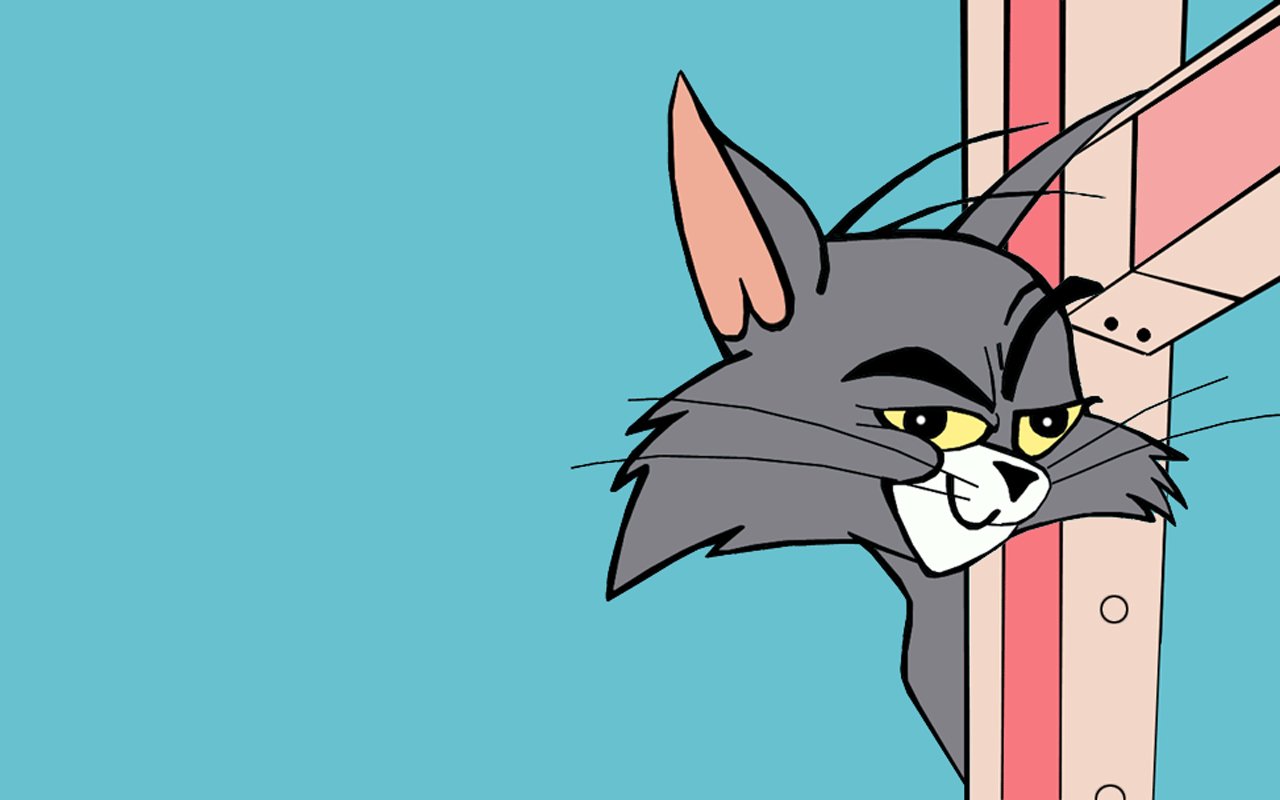 A close-up of Tom, the mischievous cat from the TV show Tom and Jerry, peering out with a sly expression against a bright blue background.