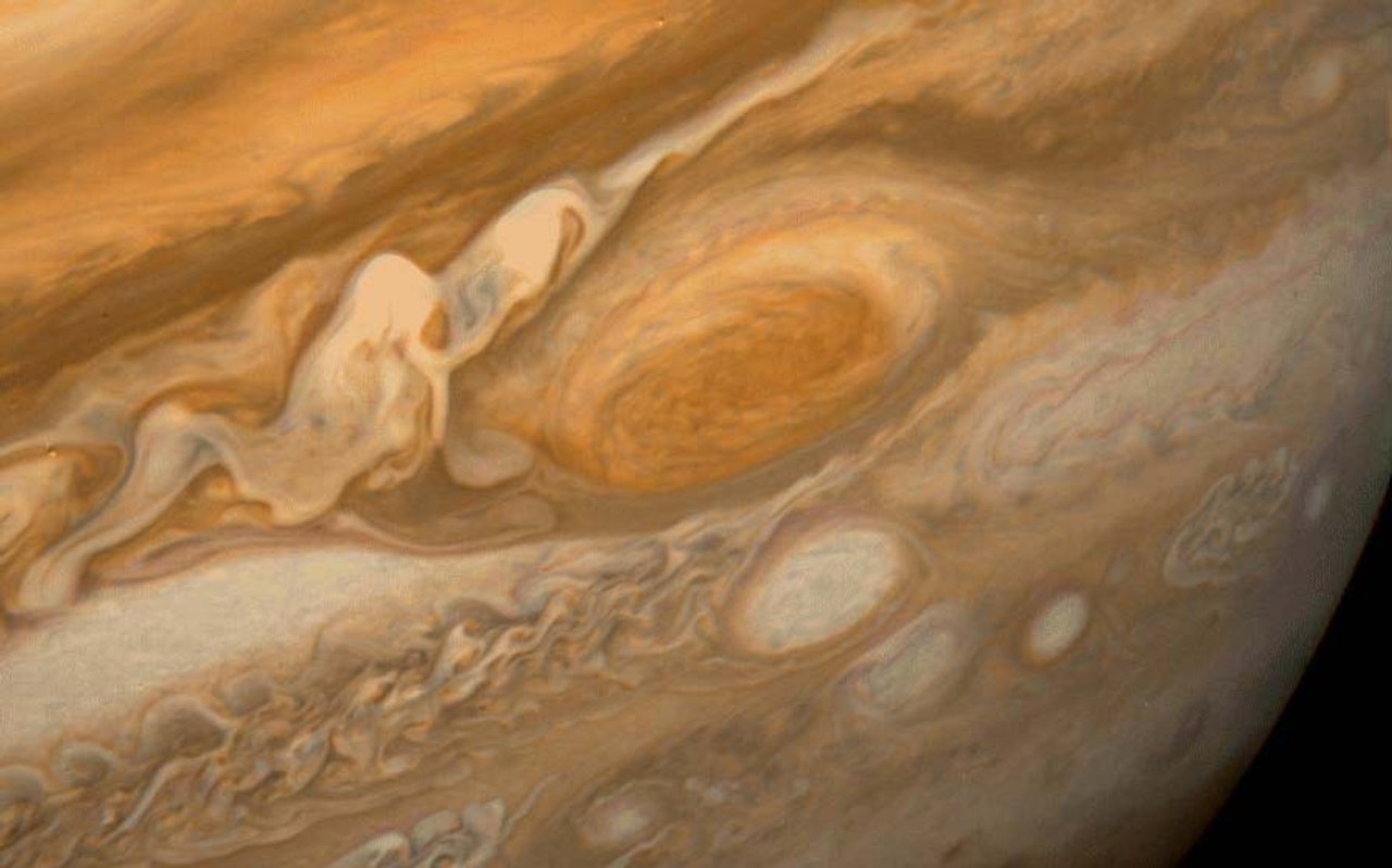 A close-up view of Jupiter, showcasing its swirling atmosphere and iconic Great Red Spot, embodies the essence of sci-fi exploration of distant planets.