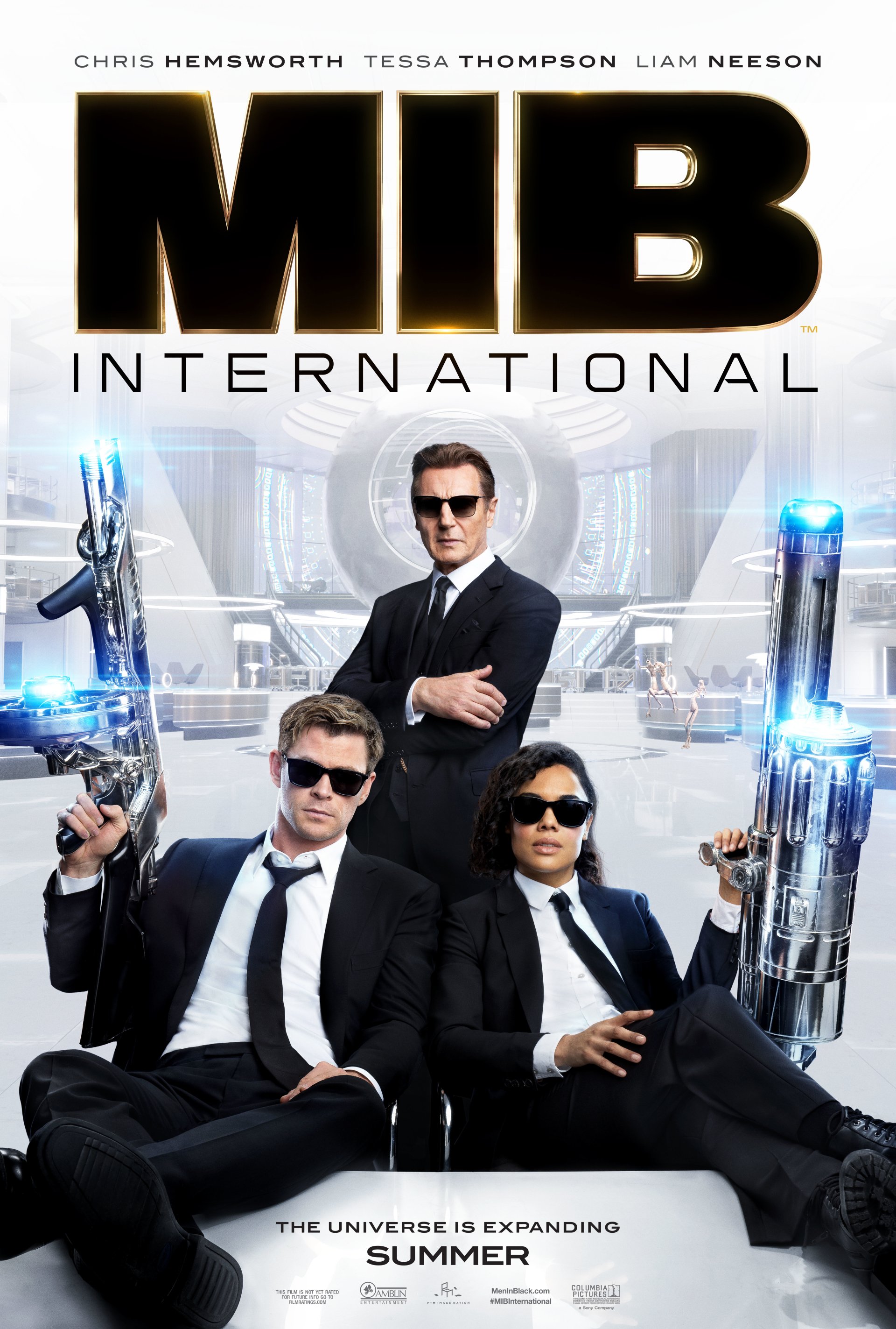 Liam Neeson Tessa Thompson Chris Hemsworth movie Men in Black: International Image