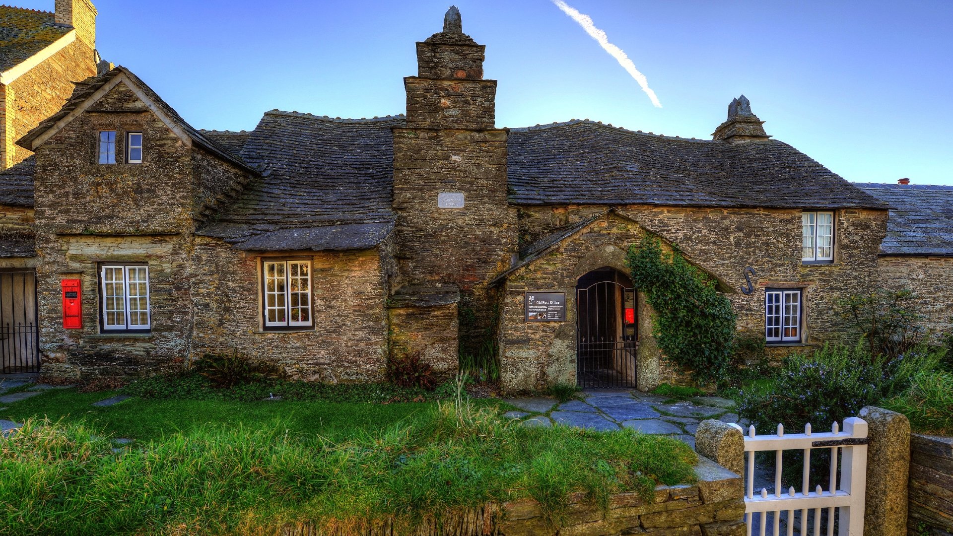 thatched roof man made cottage Image