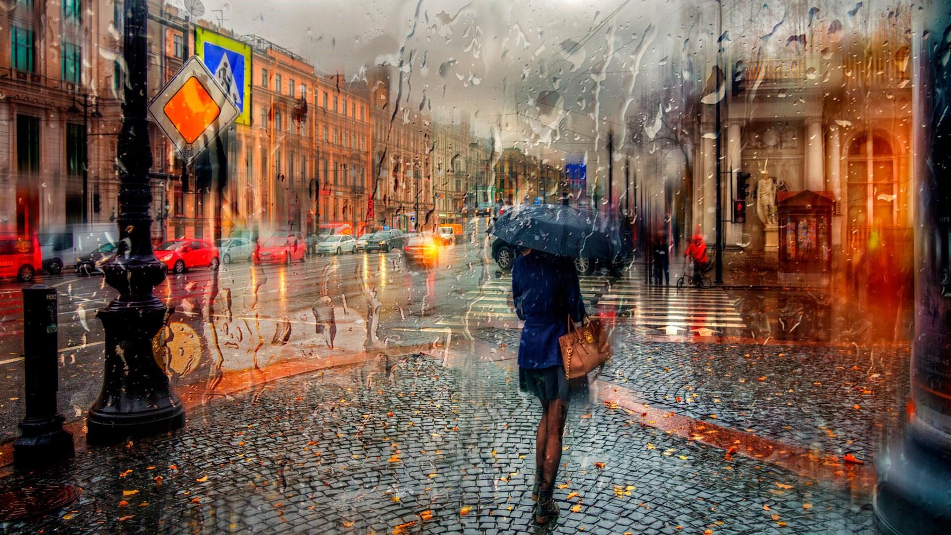 Woman on Rainy City Street - Image Abyss