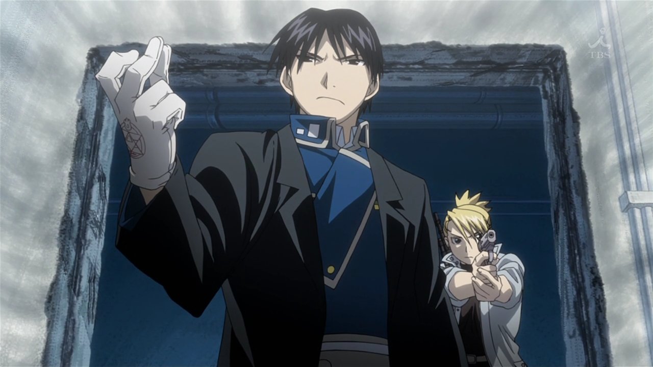 Roy Mustang stands in the foreground with a confident glare, while Riza Hawkeye readies her firearm behind him in a scene from the anime Fullmetal Alchemist.