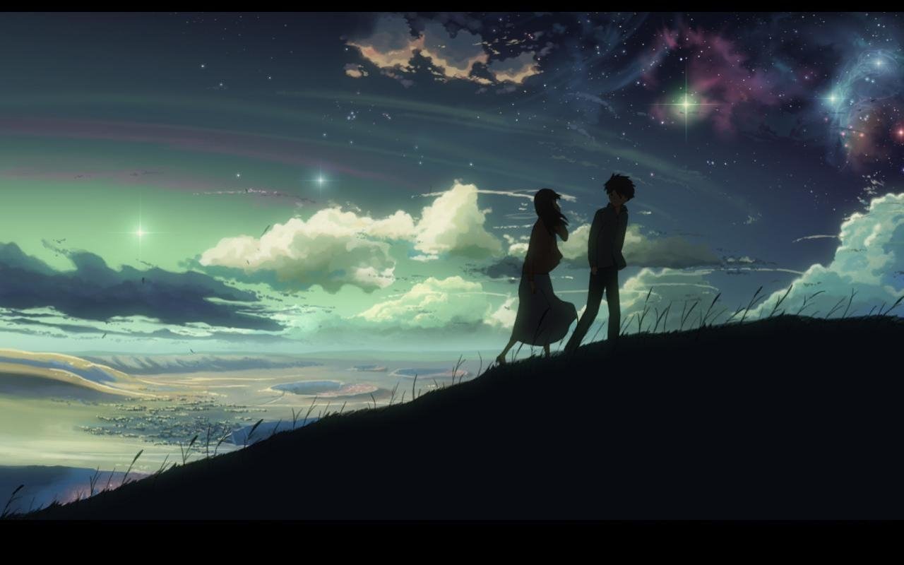 Silhouettes of a boy and girl walking on a hill under a starry sky with clouds, capturing a serene moment from the anime 5 Centimeters per Second.