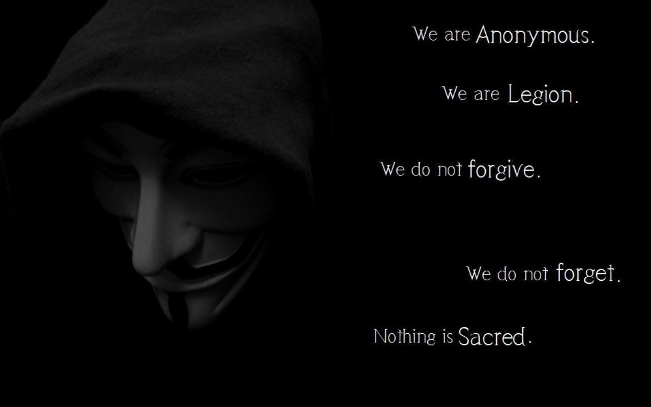 A shadowy figure wearing a mask embodies the essence of Anonymous, with bold text declaring their mantra of unity, vengeance, and the refusal to forgive or forget.
