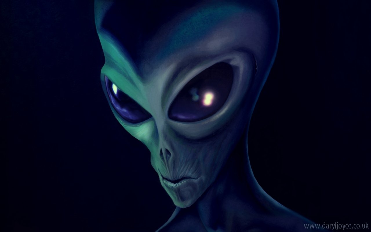 Close-up of a sci-fi alien with large, reflective eyes and smooth, bluish-green skin emerging from shadowy darkness.