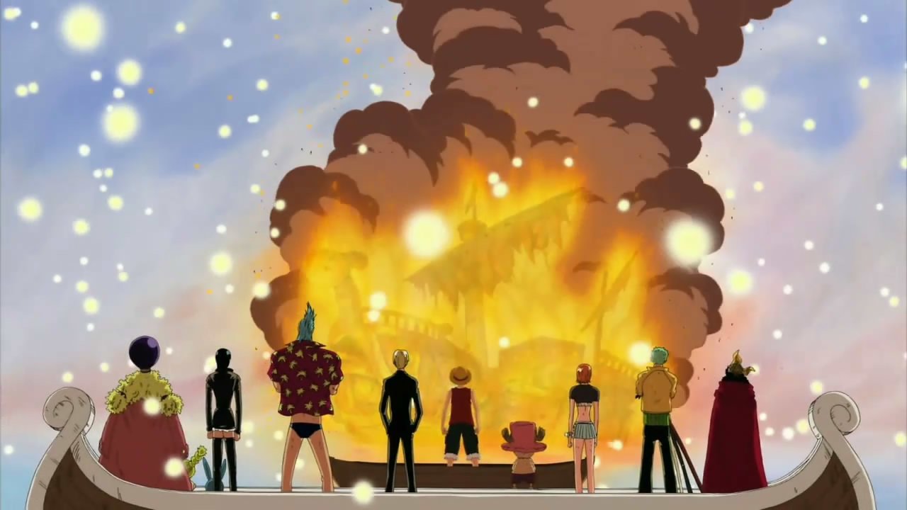 The Straw Hat Pirates from *One Piece* stand together on their ship, watching a house engulfed in flames. Characters include Luffy, Zoro, Nami, Robin, Franky, Chopper, Usopp, Sanji, Brook, and Kokoro.