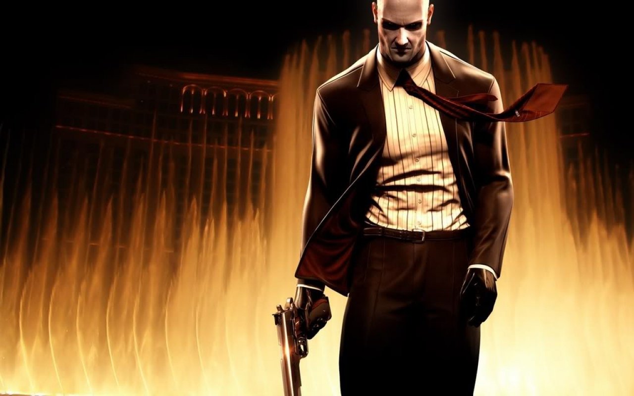 Hitman: Blood Money artwork — bald, suit-clad assassin holding a silenced pistol against a stylized wall of flames.