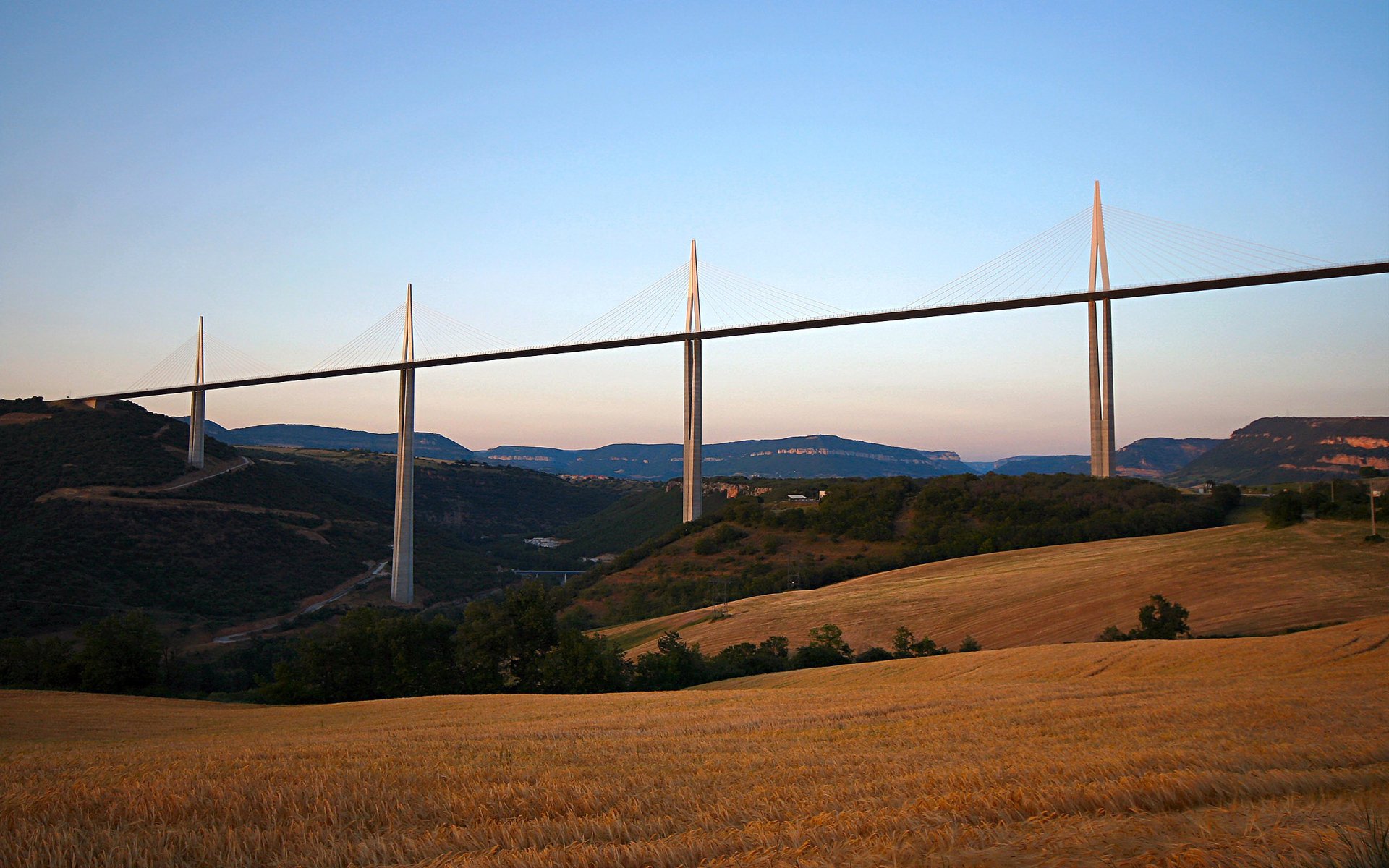 Download Mountain Field Sunset Bridge Man Made Millau Viaduct Image