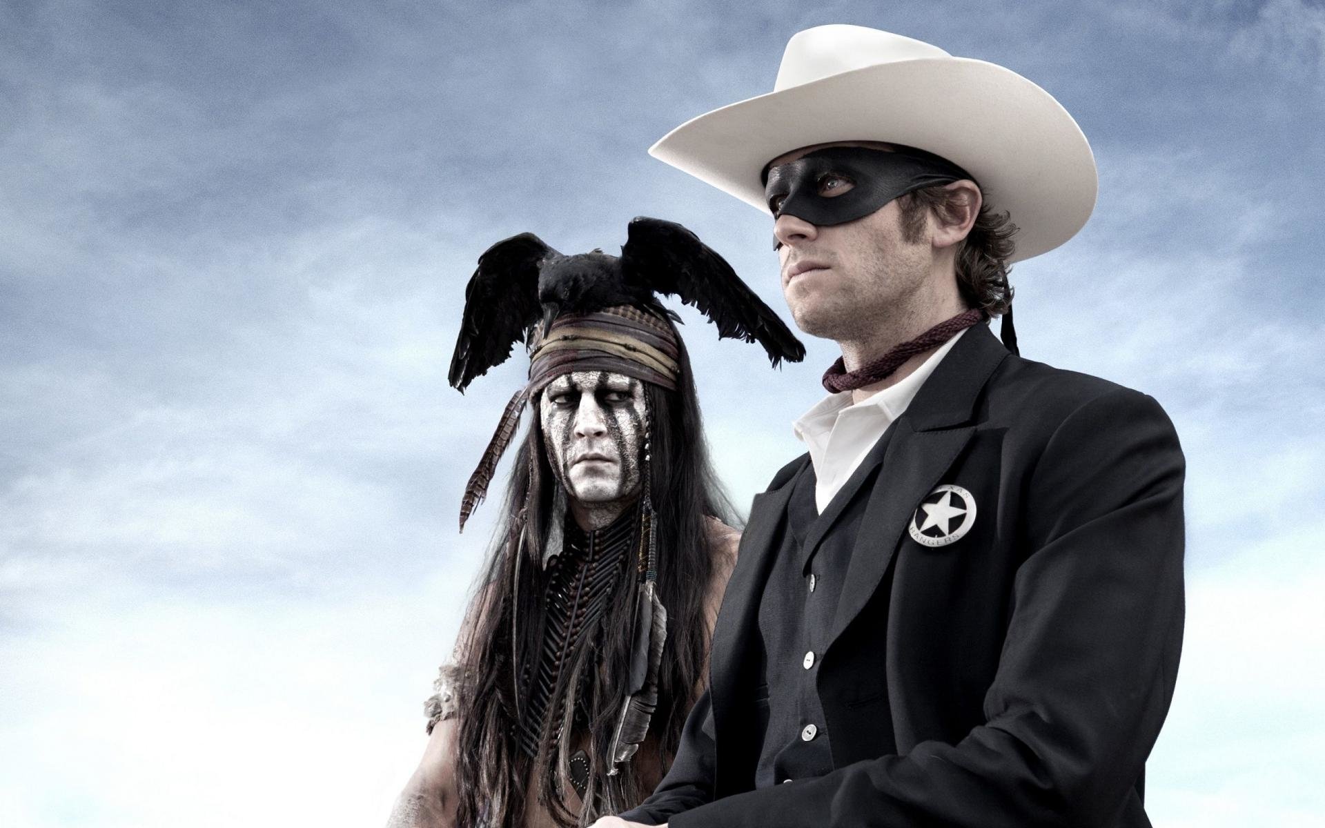 Armie Hammer and Johnny Depp star in The Lone Ranger, featuring a striking scene of their characters against a dramatic sky, embodying the film's adventurous spirit.
