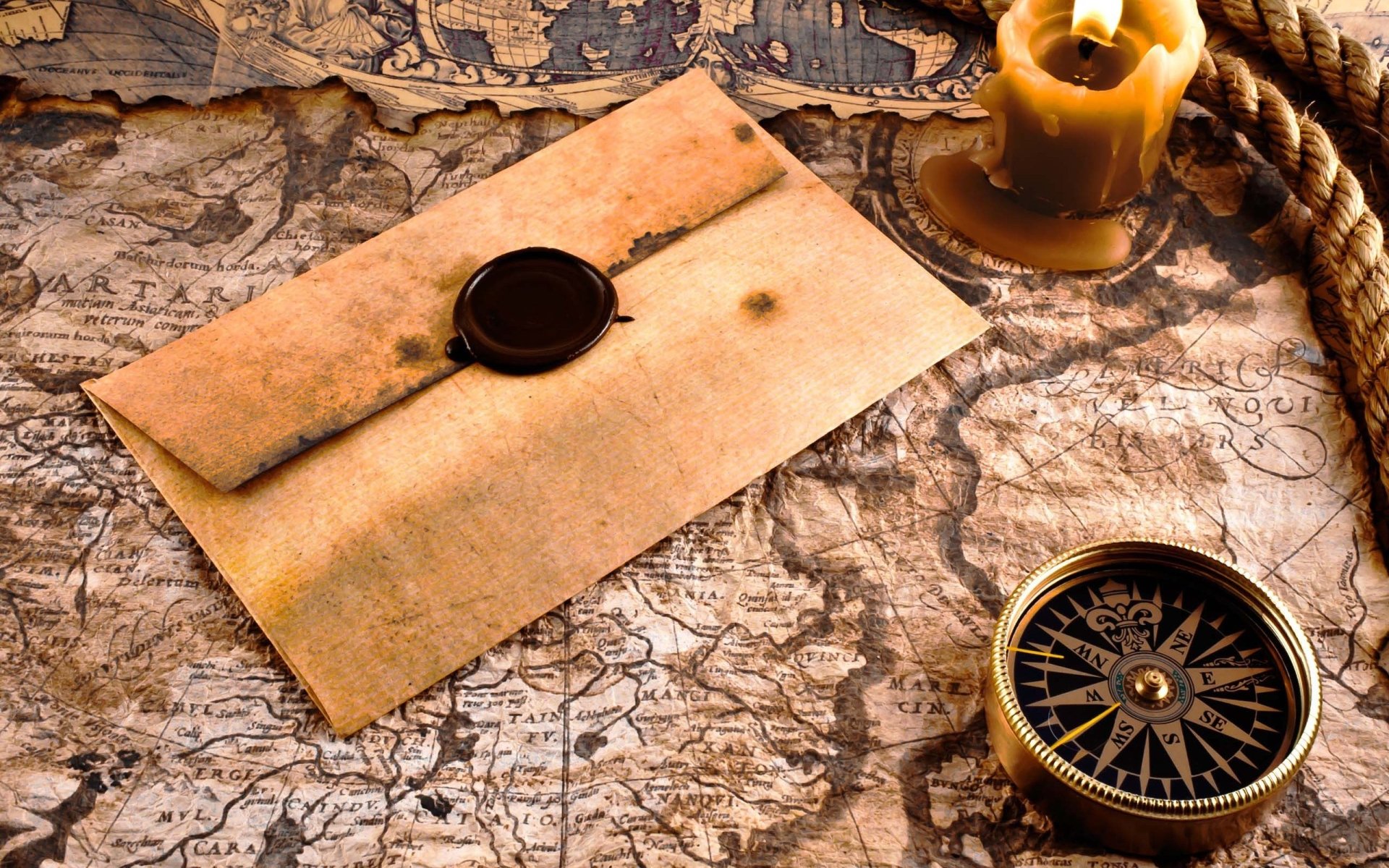 An aged letter sealed with wax rests on an intricate map, accompanied by a compass and a lit candle, evoking a sense of adventure and exploration.