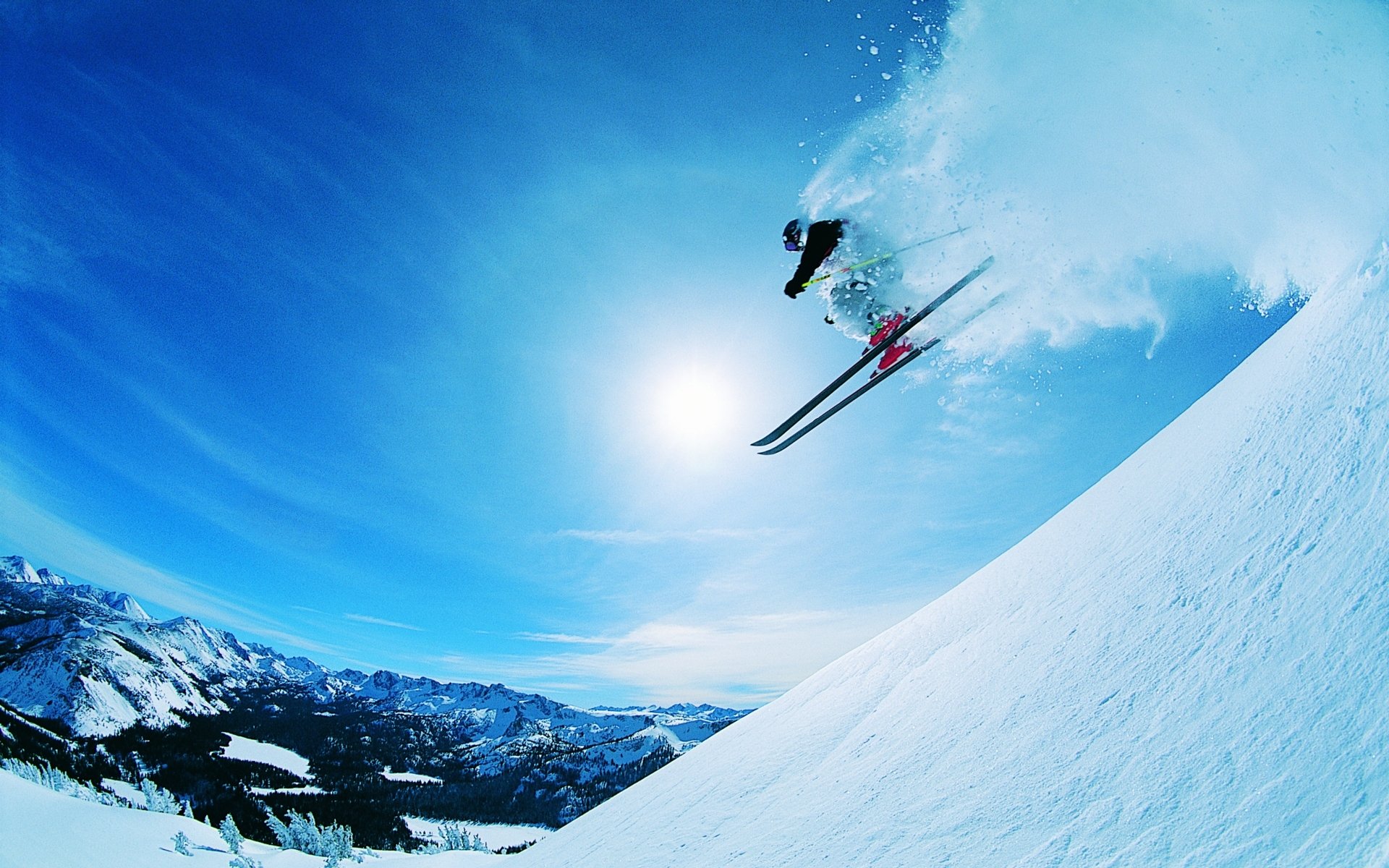  racing downhill on skies
