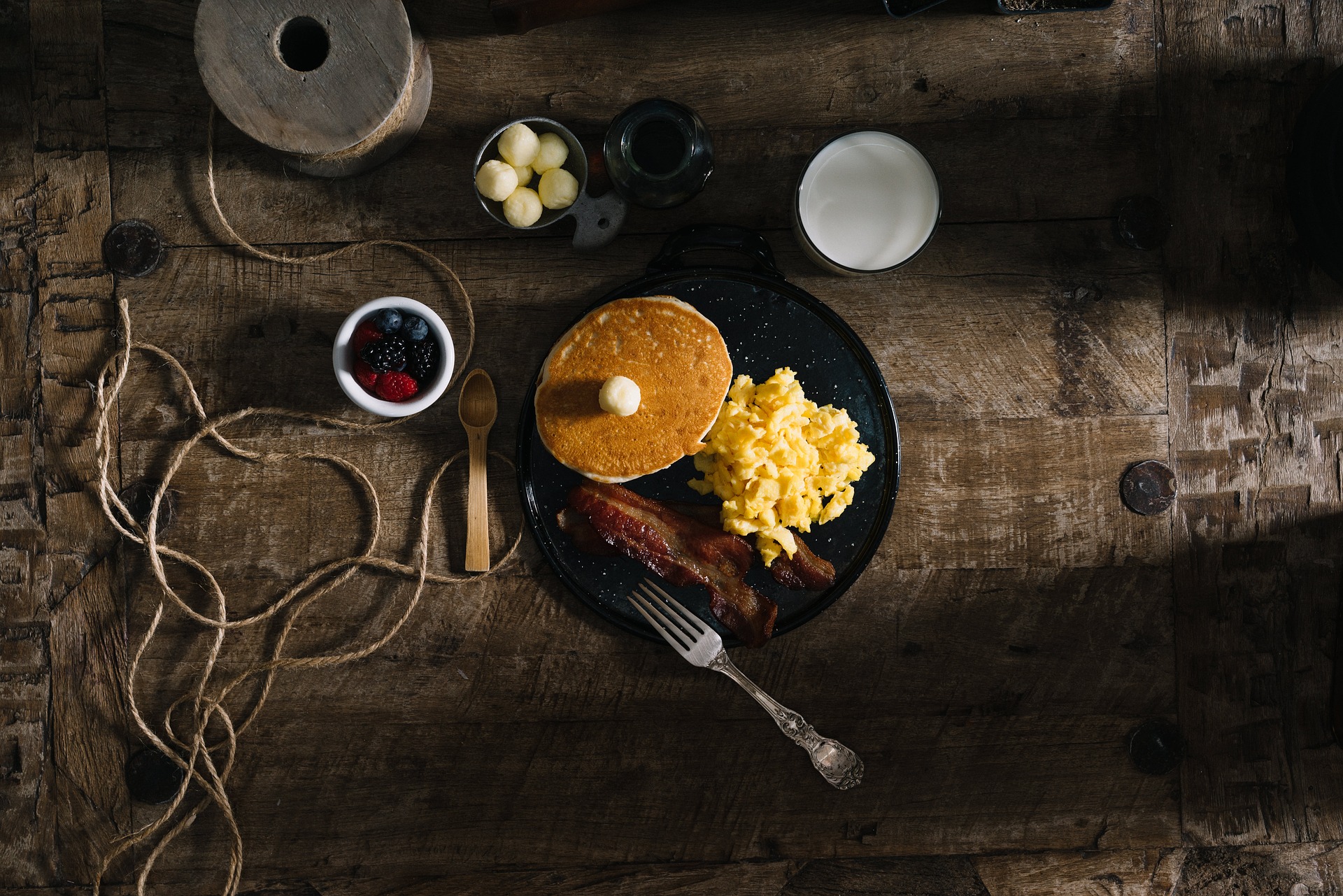 Breakfast on an old rustic wooden table