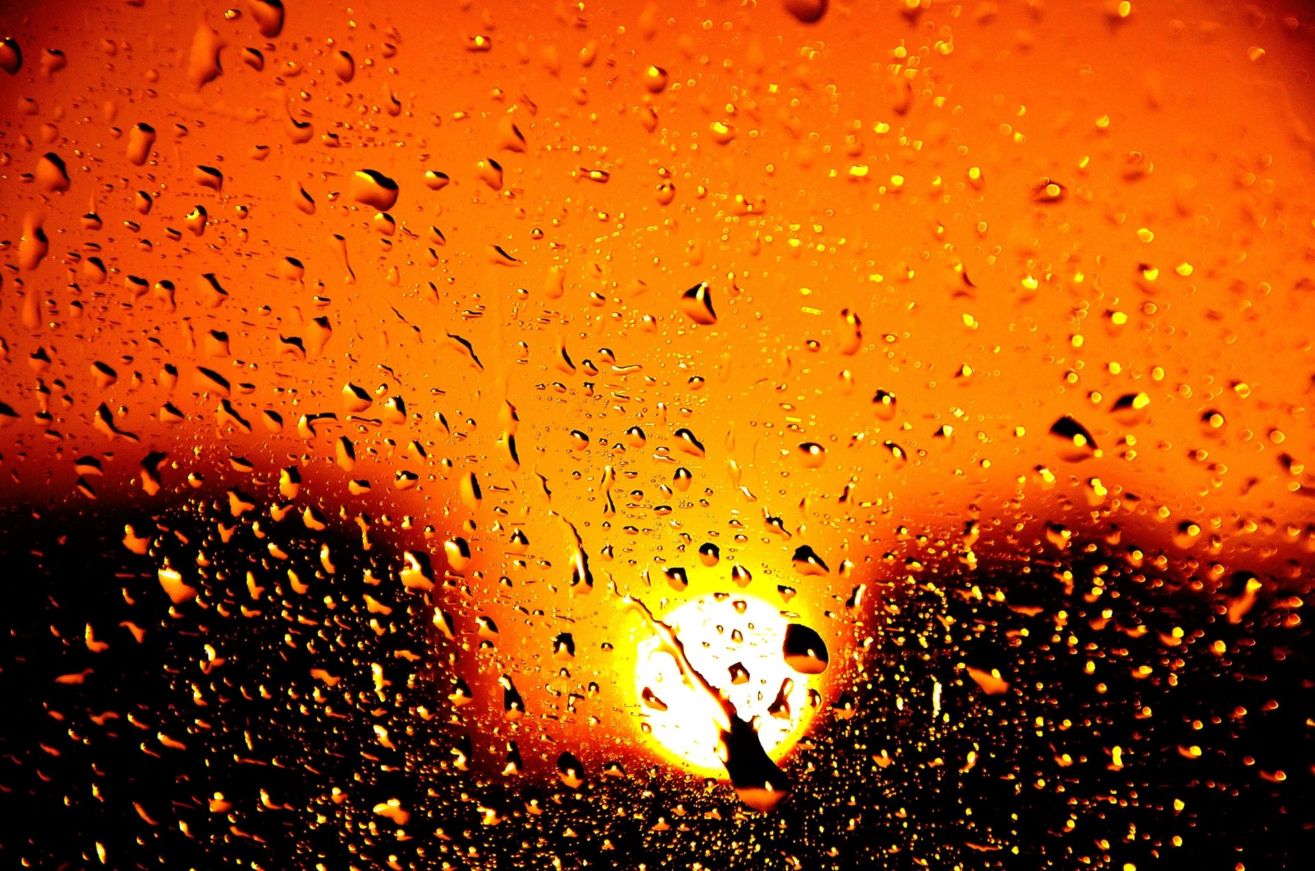  Sunset through wet window