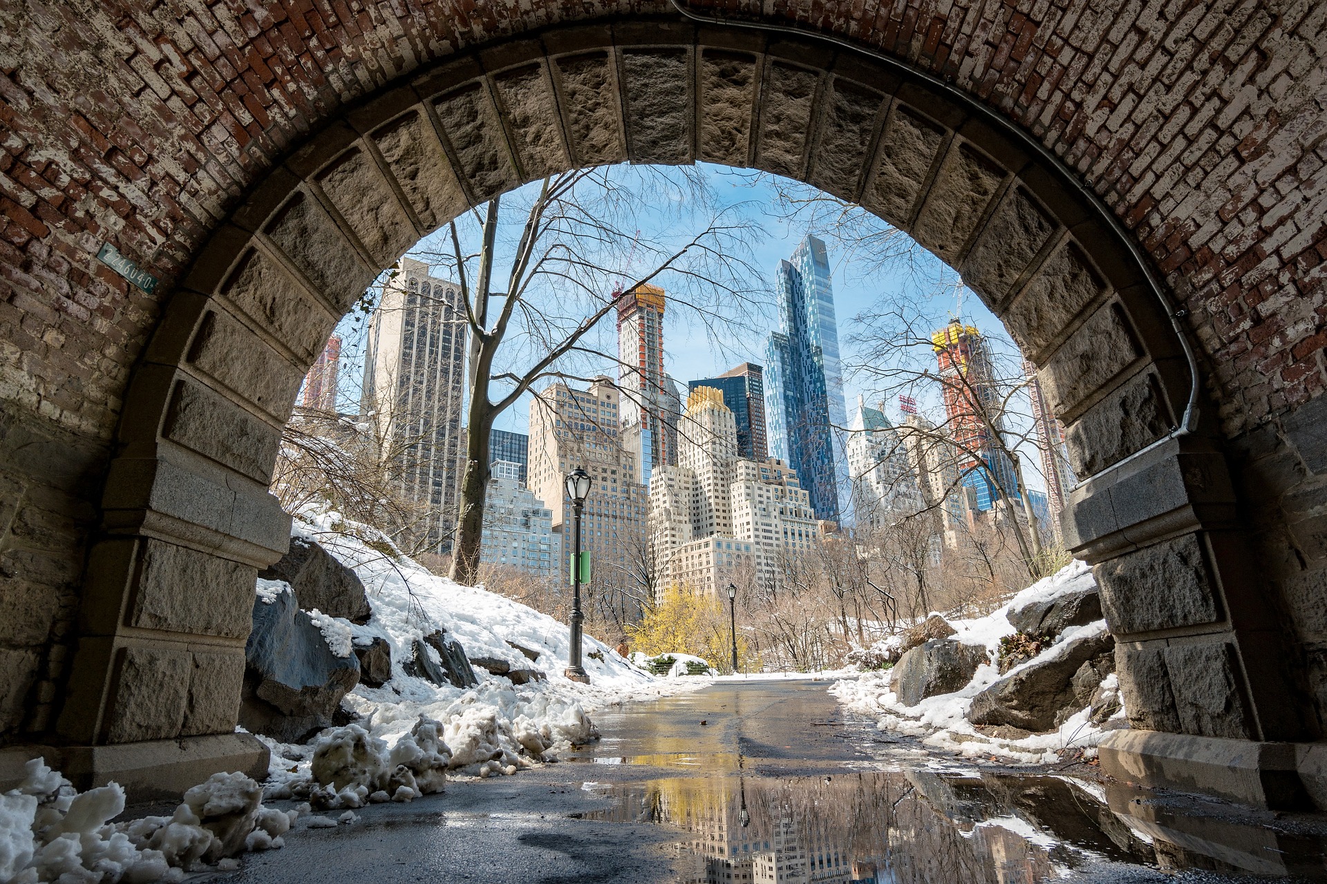 View of Central Park Manhattan from under a Bridge by skeeze