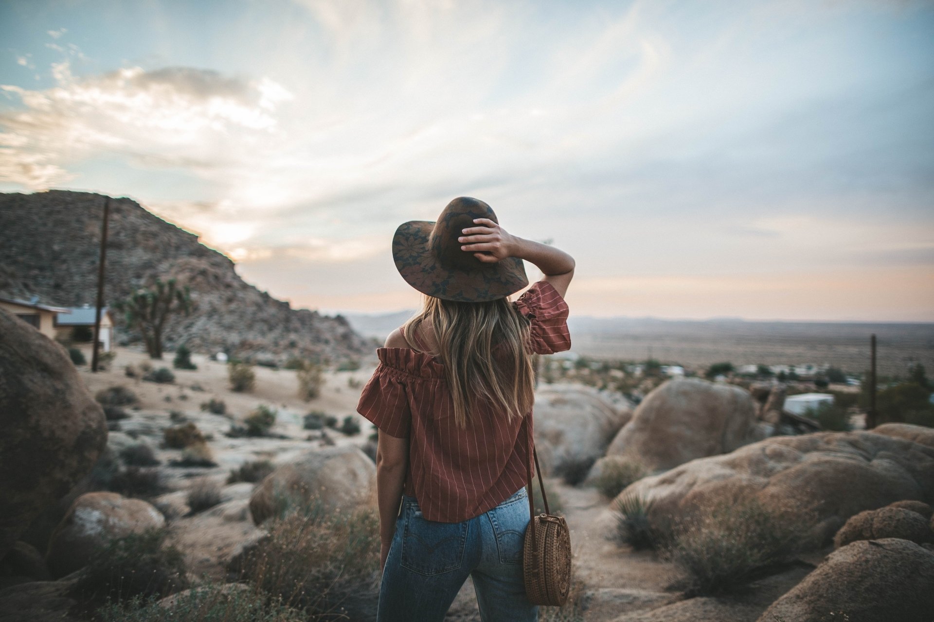  Carleigh looking off into the sunset, Joshua Tree National Park by Roberto Nickson