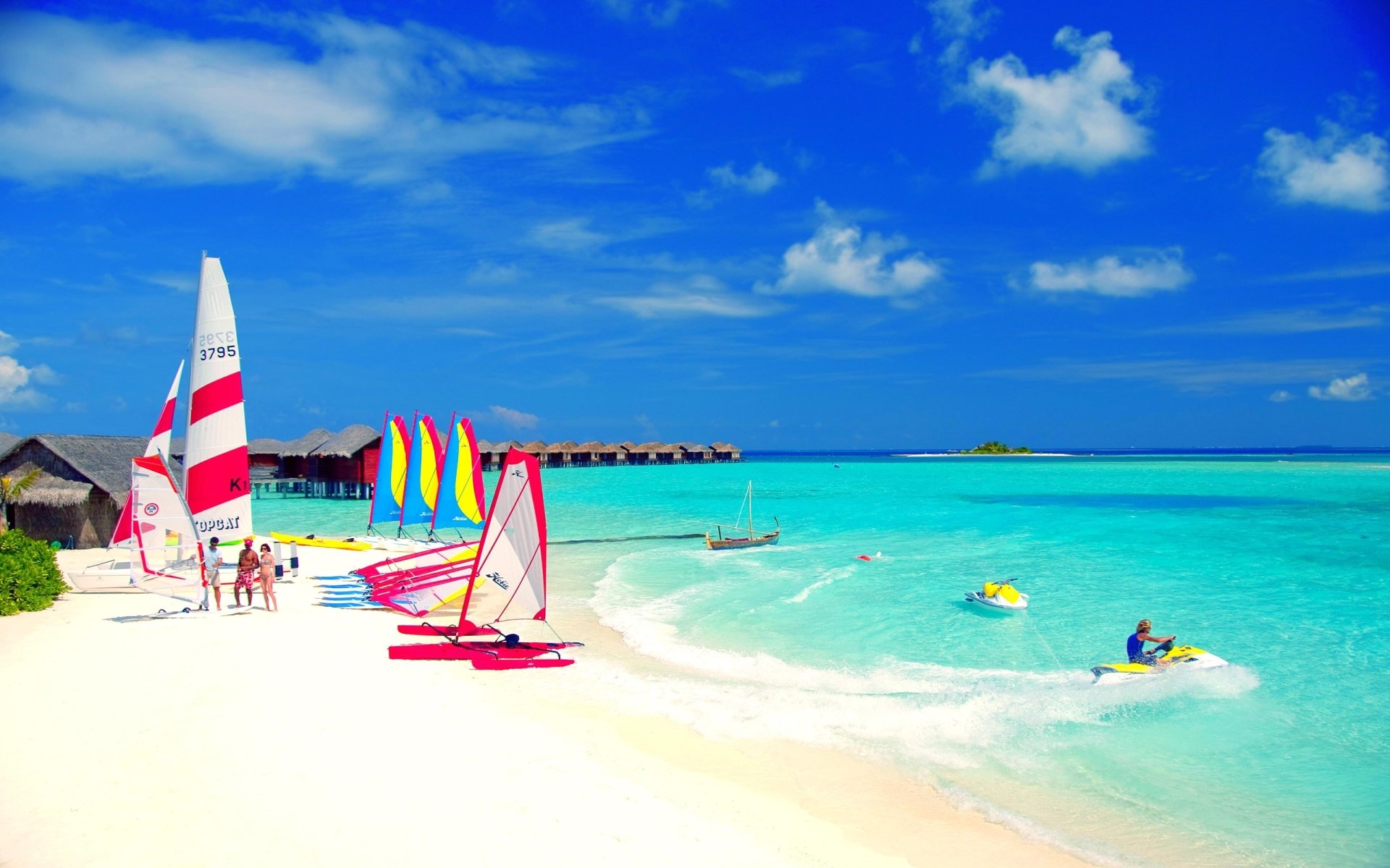  Colorful Sailboats on Tropical Beach