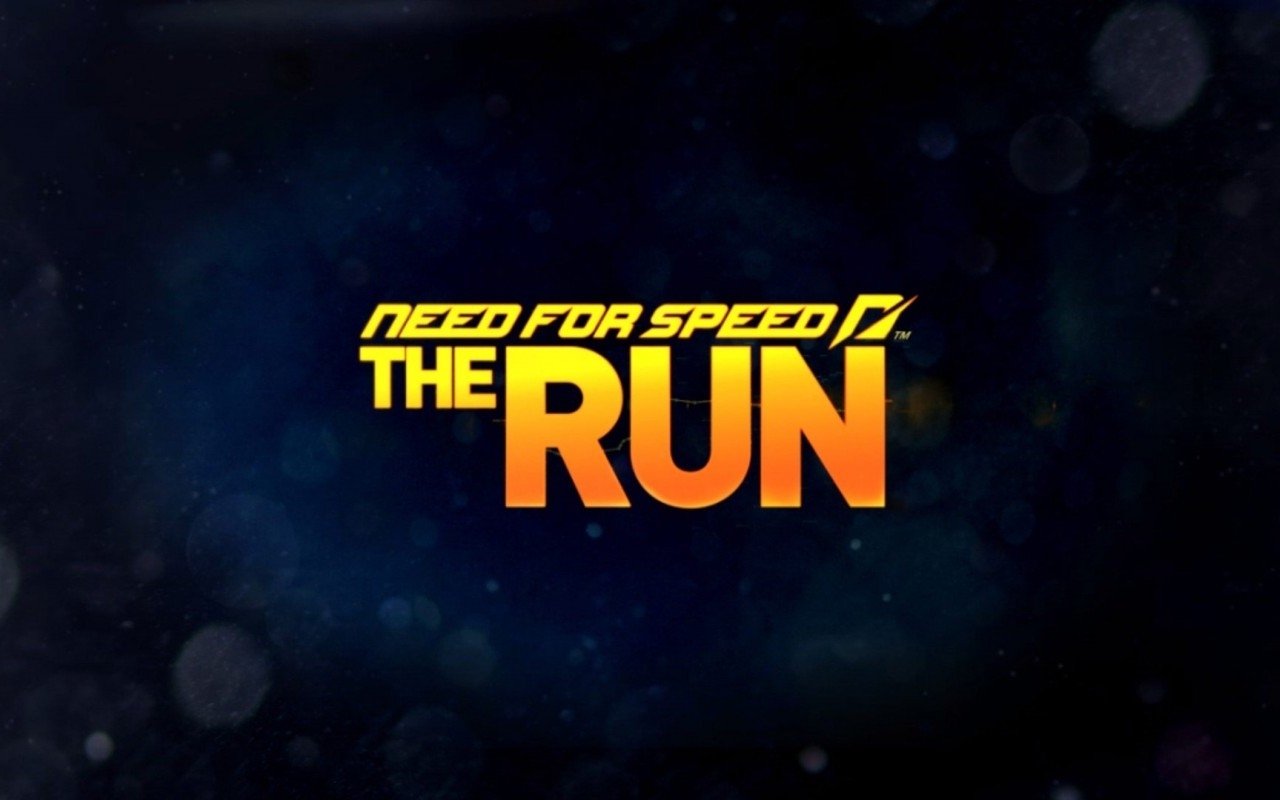 Logo for the video game Need for Speed: The Run displayed against a dark, blurred background.