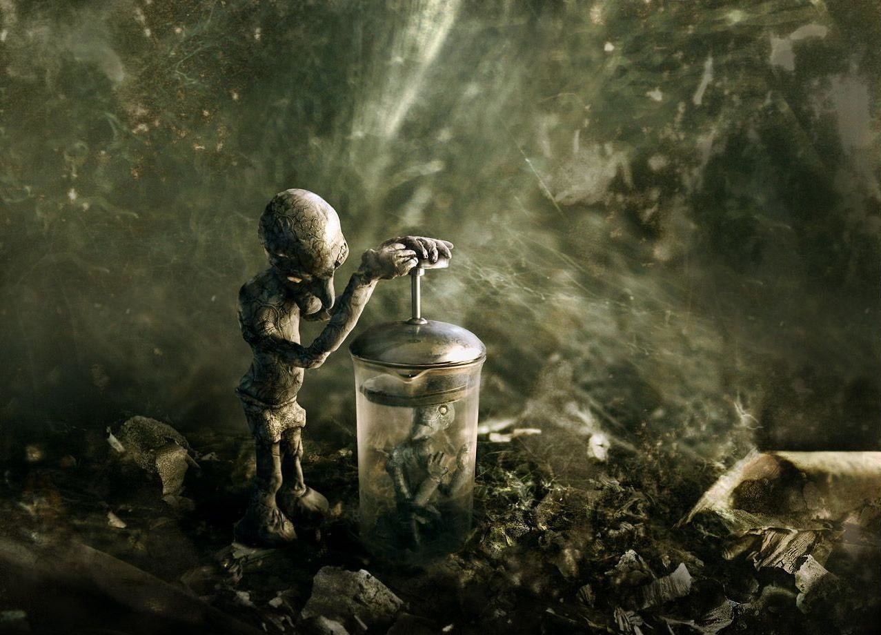 A small cyborg figure stands beside a glass container, surrounded by debris in a dark, sci-fi environment, evoking themes of technology and decay.