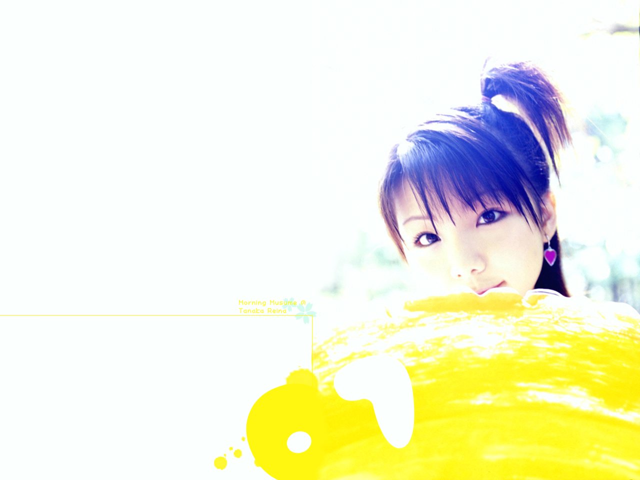 A sensual woman gazes toward the camera, partially hidden behind a vibrant yellow shape, with sunlight softly illuminating her features and playful hairstyle.