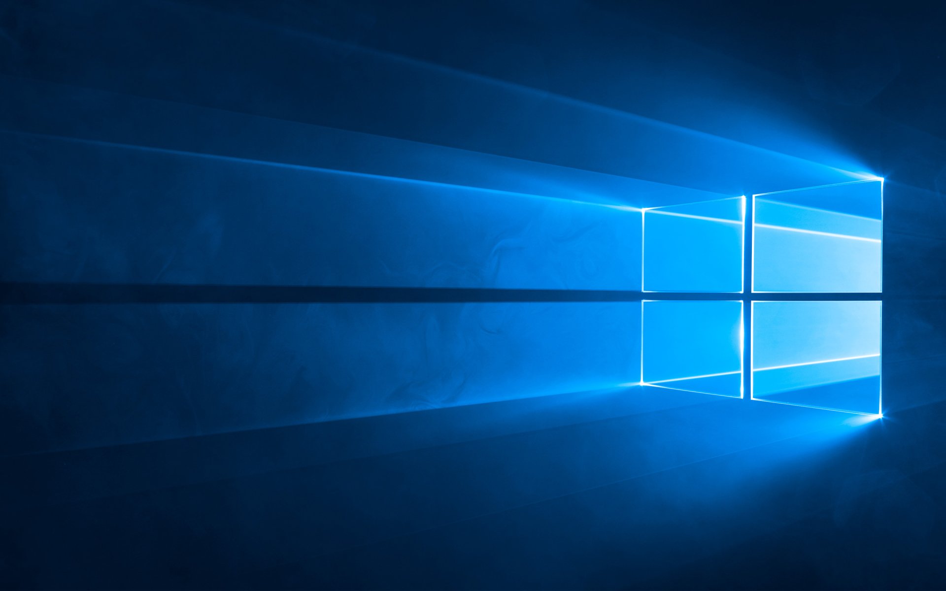 A sleek blue background featuring the Windows 10 logo, highlighting technology and modern design with beams of light emanating from the window.