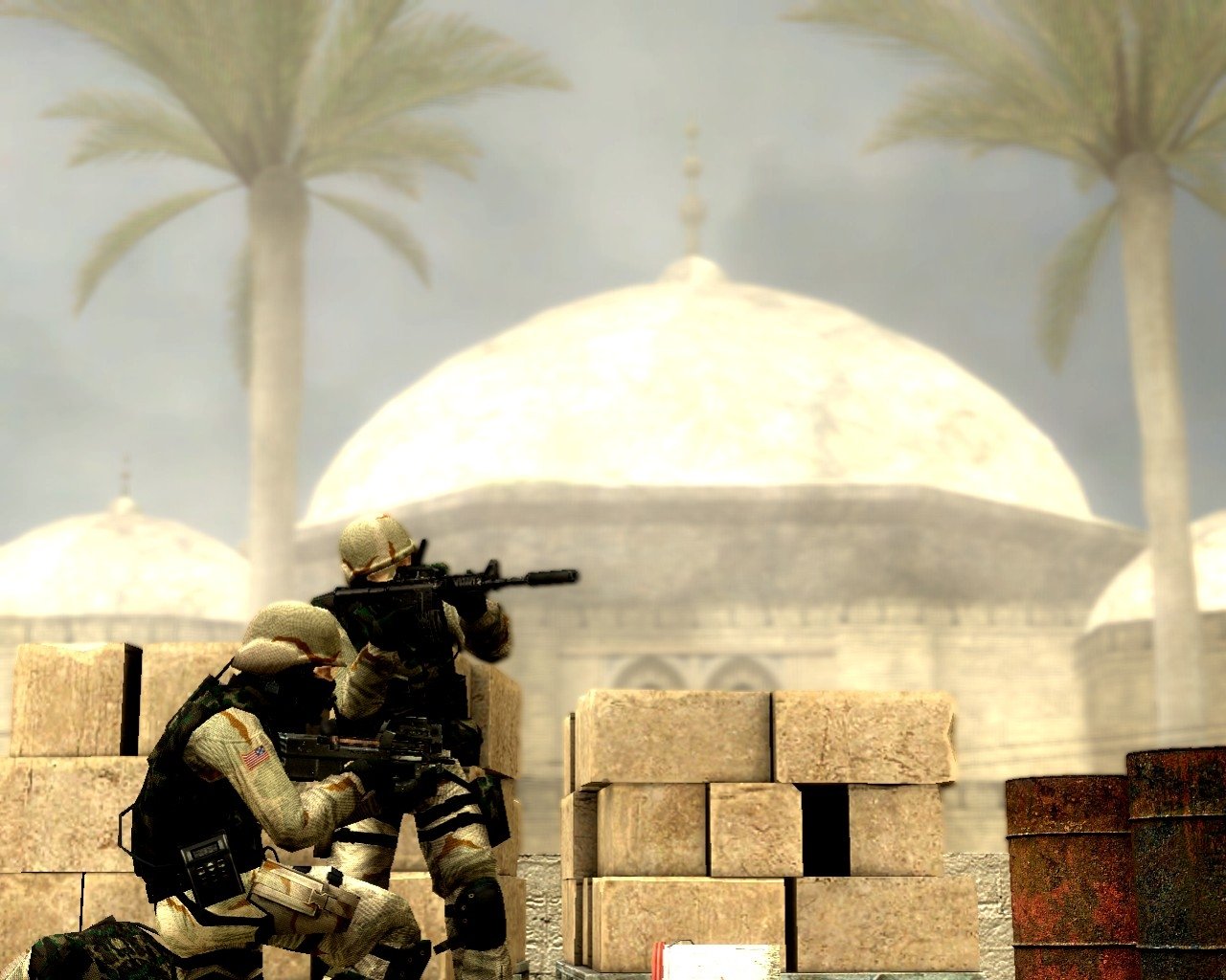Two soldiers engage in a tactical scenario in a video game setting, taking cover behind crates with palm trees and a dome structure in the background.