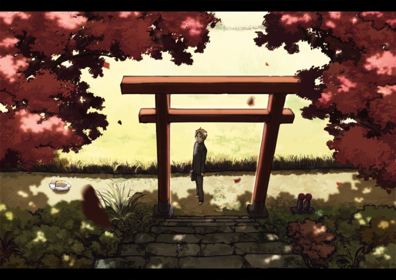 Scene from Natsume Yuujinchou (Natsume's Book of Friends) featuring a character standing beneath a traditional red torii gate surrounded by autumn foliage.