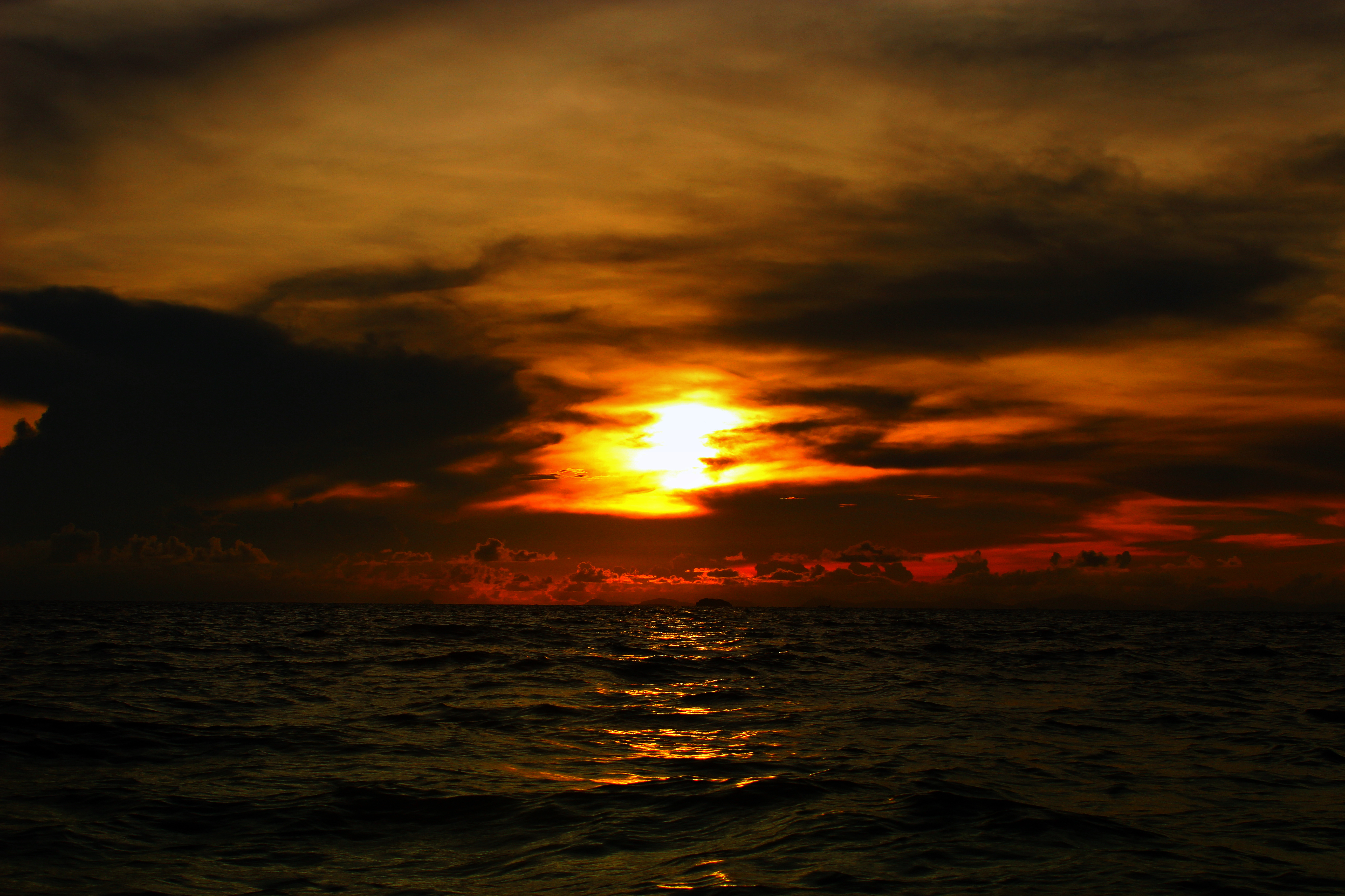 Sunset on open sea by NatureWorshiper