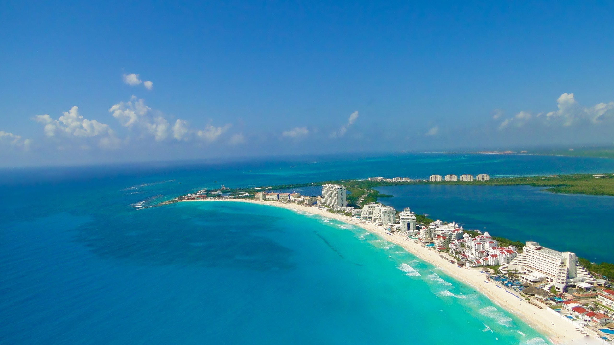 Cancún on the Yucatán Peninsula is a beachfront strip of high-rise hotels, nightclubs and resorts