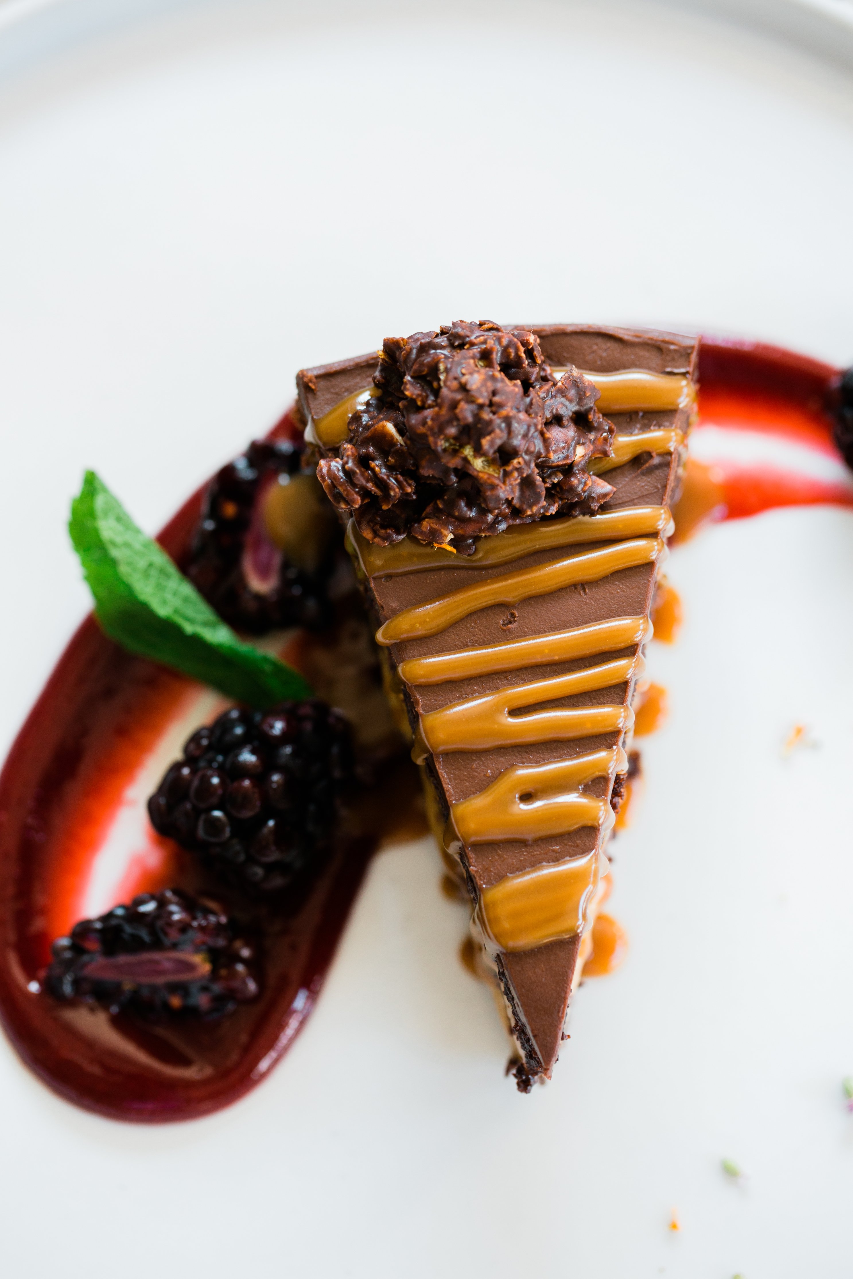 Top View Of Chocolate Cake With Raspberry Coulis by Karen Culp