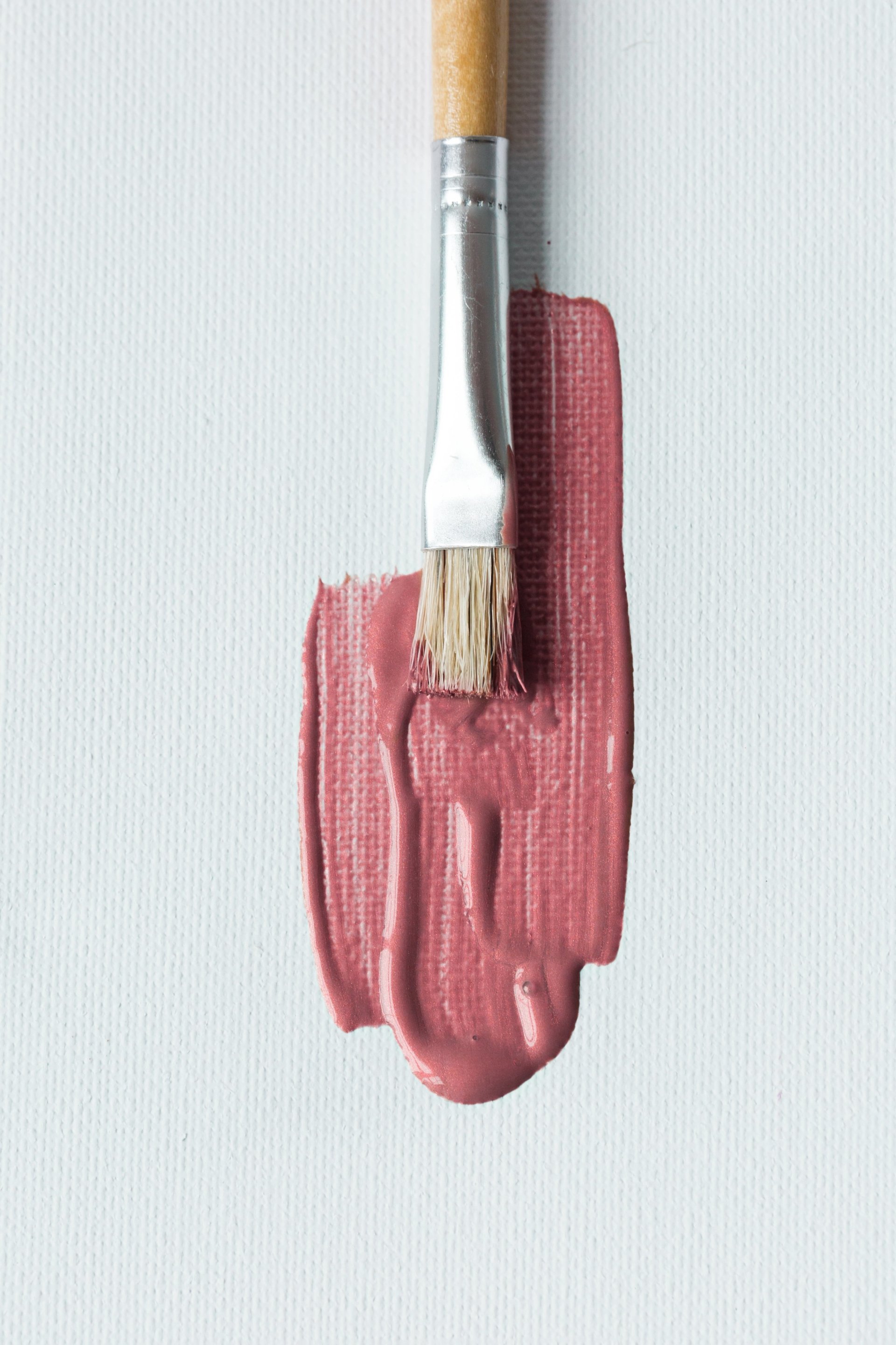  Paintbrush With Pink On Canvas by Sarah Pflug
