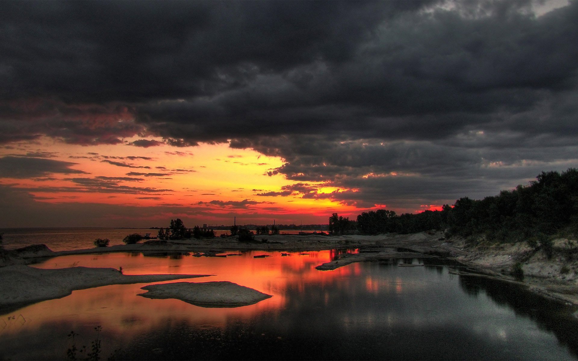 Twilight Serenity: Nature’s Fiery Sunset Reflection