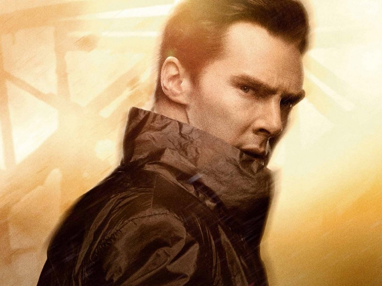 Close-up of a serious man in a dark jacket against a bright, abstract background from the movie Star Trek Into Darkness.