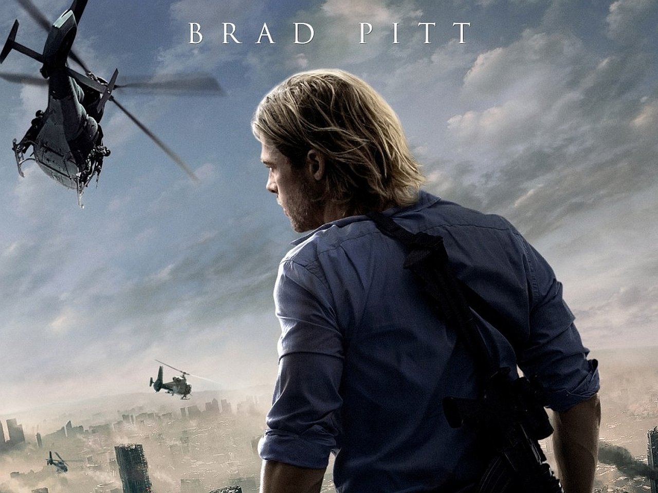 Movie poster for World War Z: a man with a shoulder harness surveys a ruined city as helicopters hover in a stormy sky.